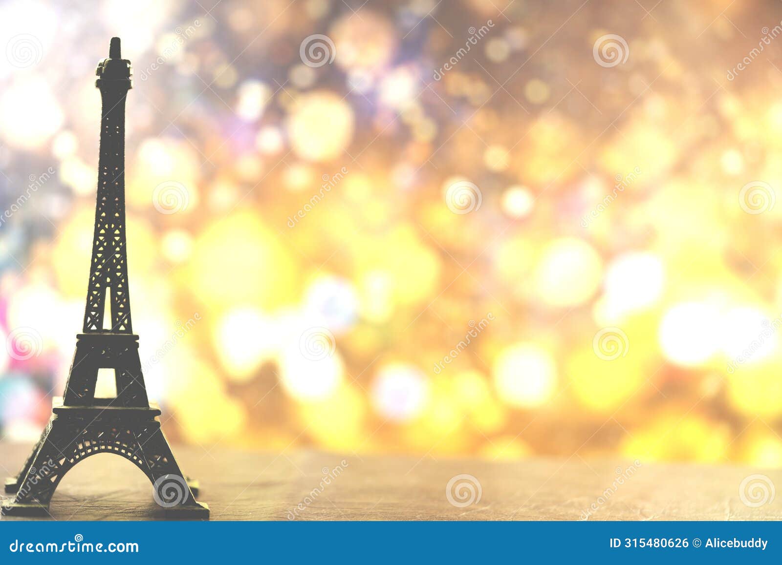 glitter background with eiffel tower model with for multi purpose and inspiraiton or advertise