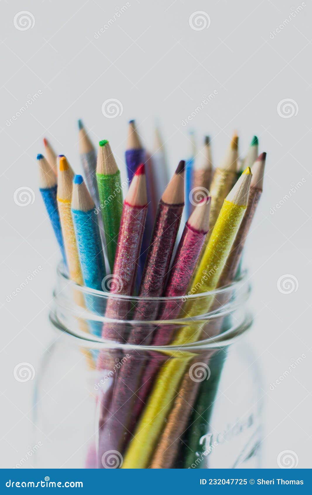 Glitter Colored Pencils in a Glass Jar Stock Image - Image of