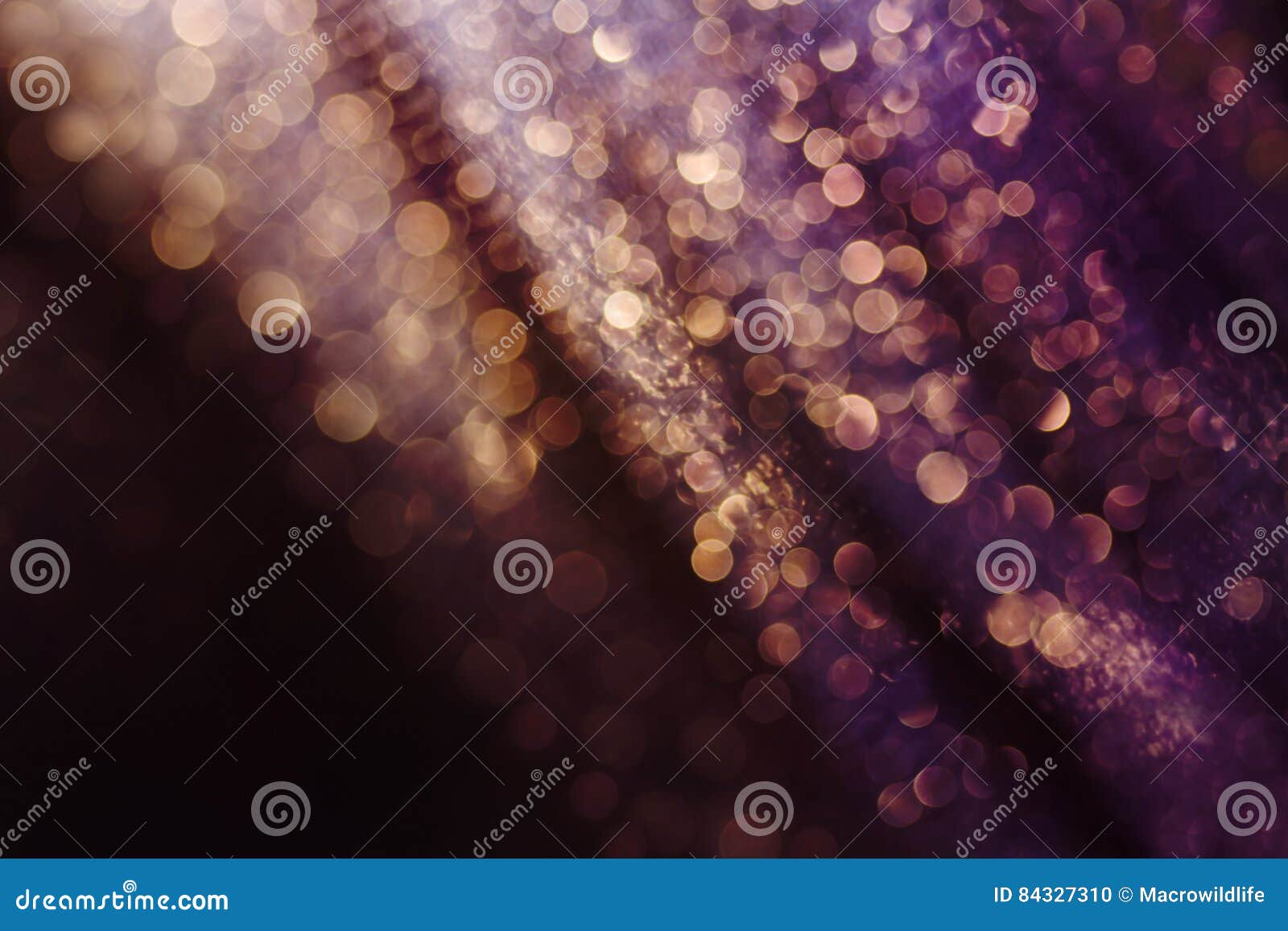 Glitter and Glow Soft Multi Colored Bokeh Shining . Dark Abstract