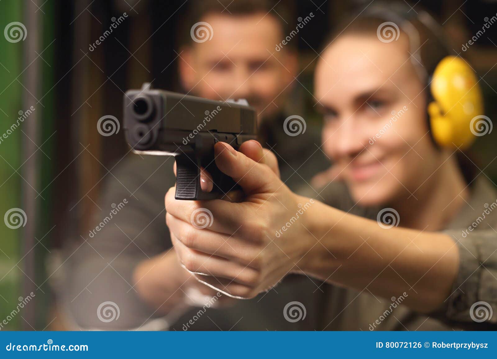 glock, woman shoots at the shooting range