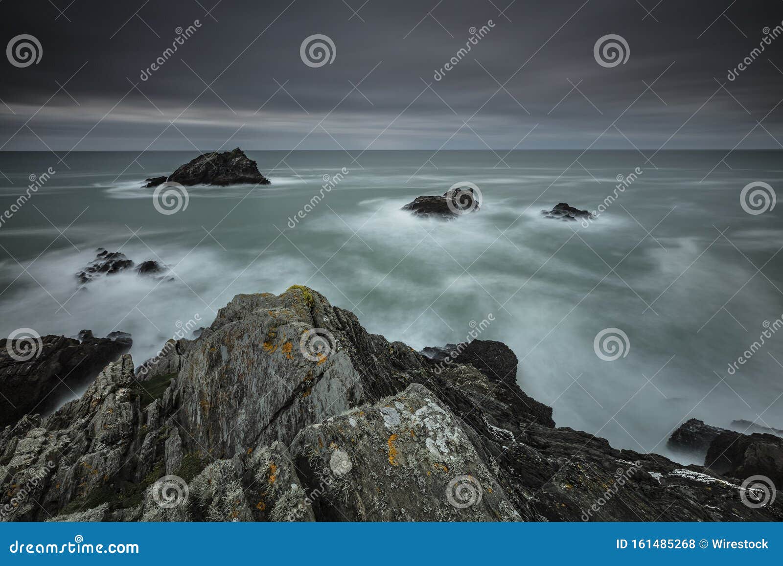 Gloomy Scenery of the Ocean Under the Dark Clear Sky in Atlantic Coast, Cornwall, UK Stock Photo - of cliffs, blue: