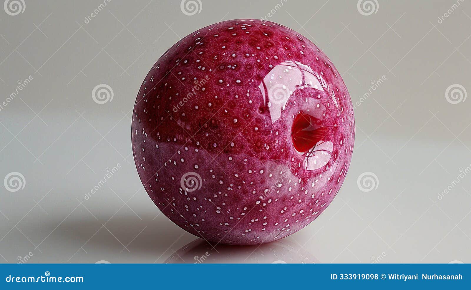 glossy red sphere with white speckles