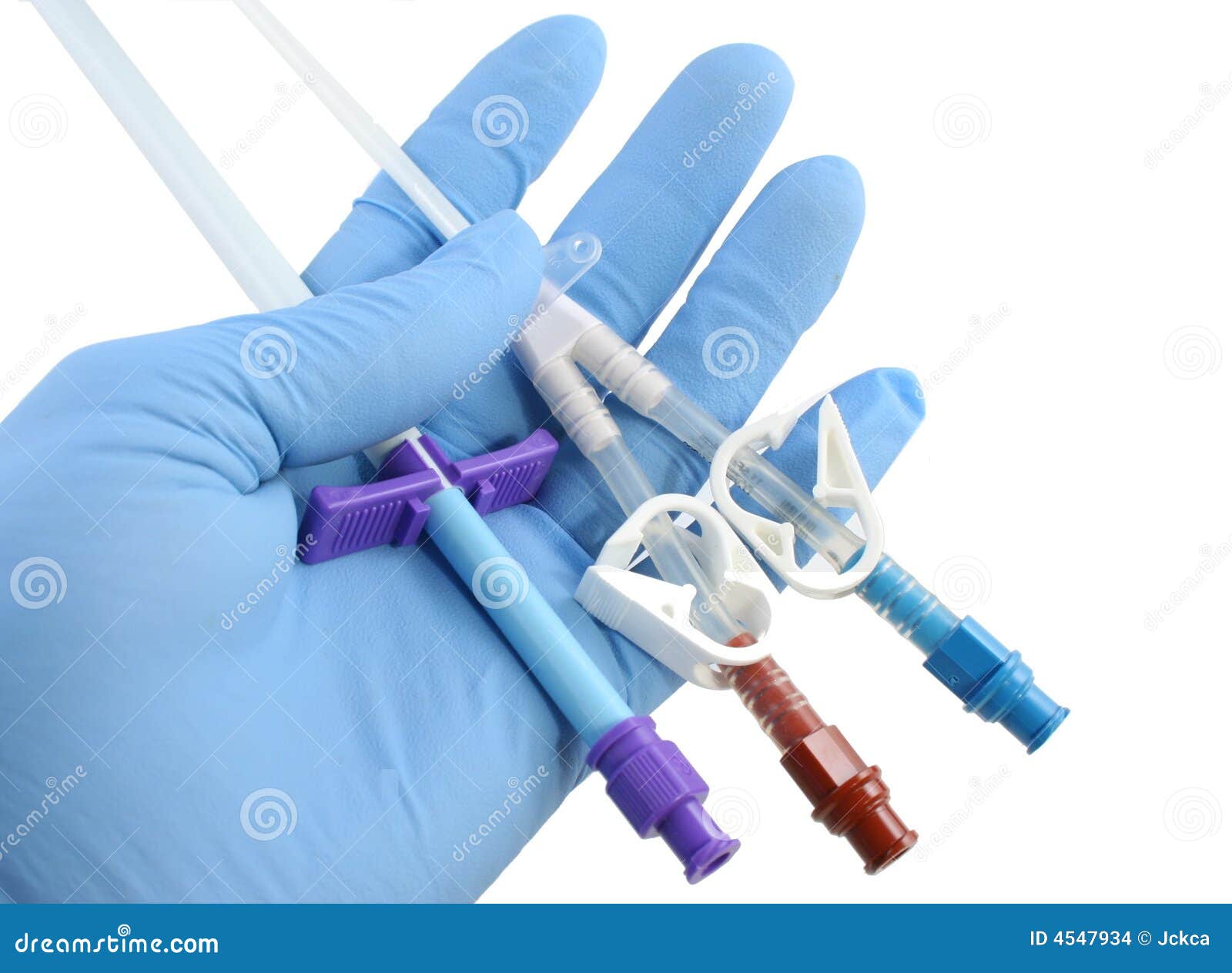 Gloved Hand Holding a Catheter and Introducer Stock Photo Image of
