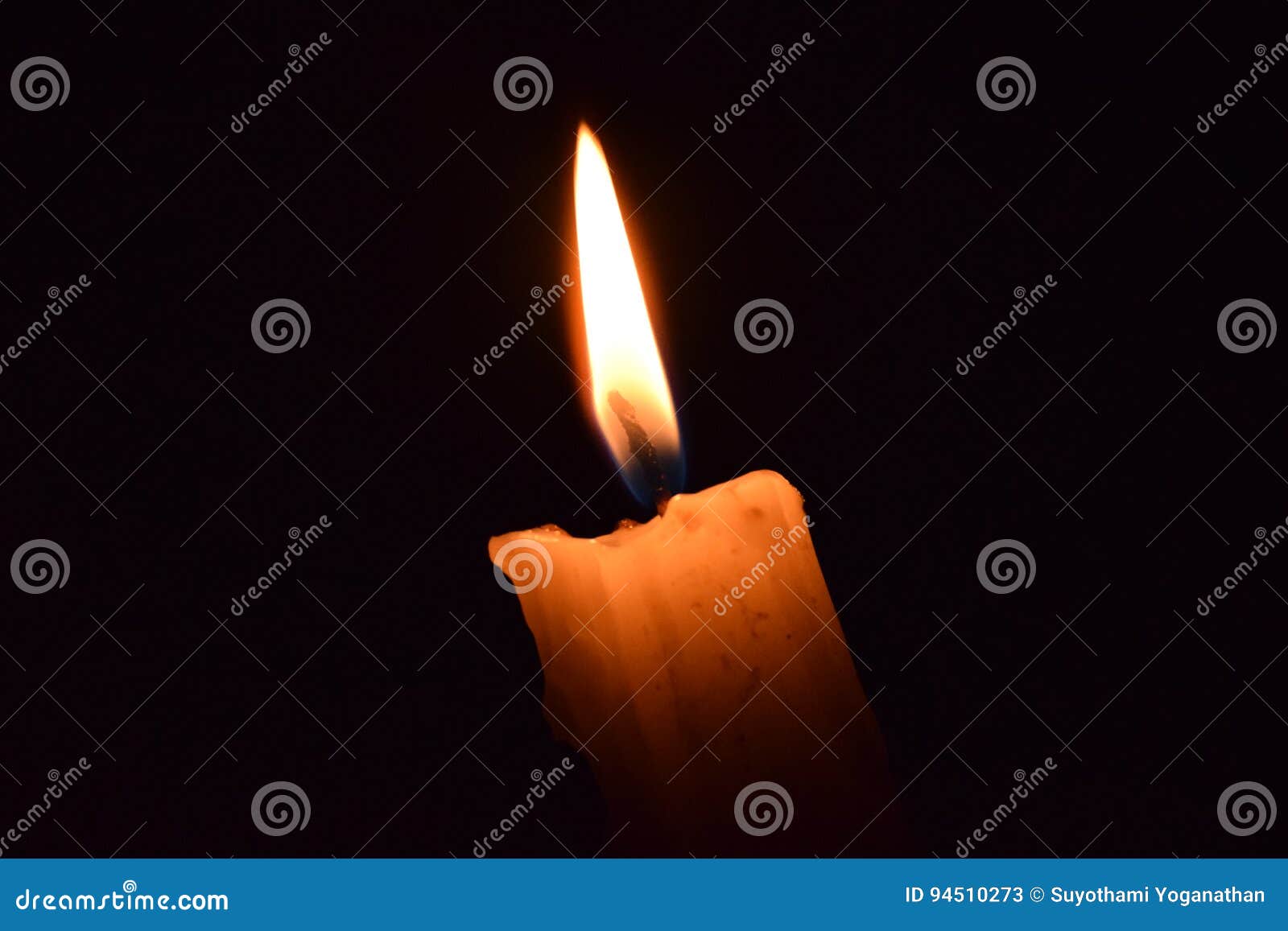 Glowing candle stock image. Image of darkness, flame - 94510273