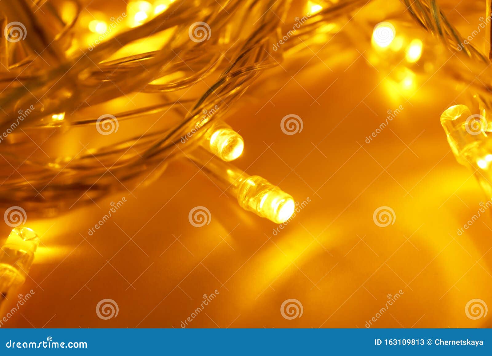 Glowing Christmas Lights on Yellow Background Stock Image Image of