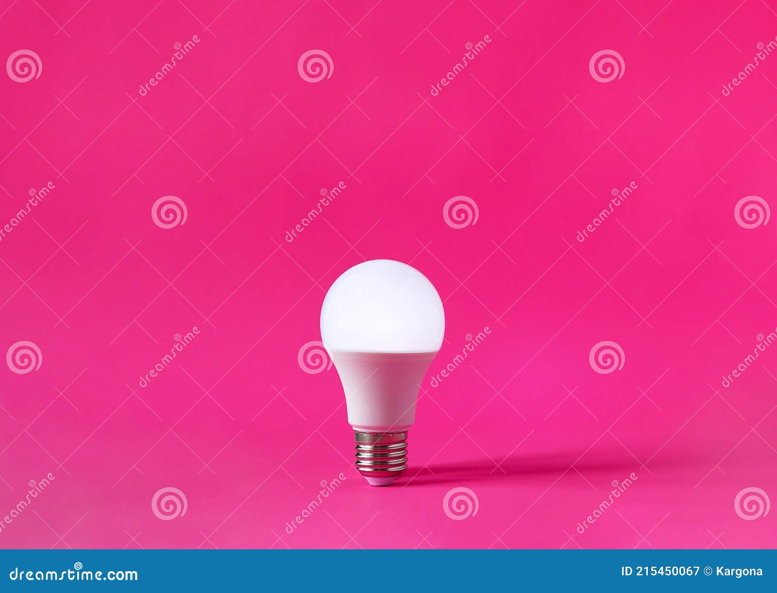 glowing light bulb on magenta background. discovery, invention, new idea concept