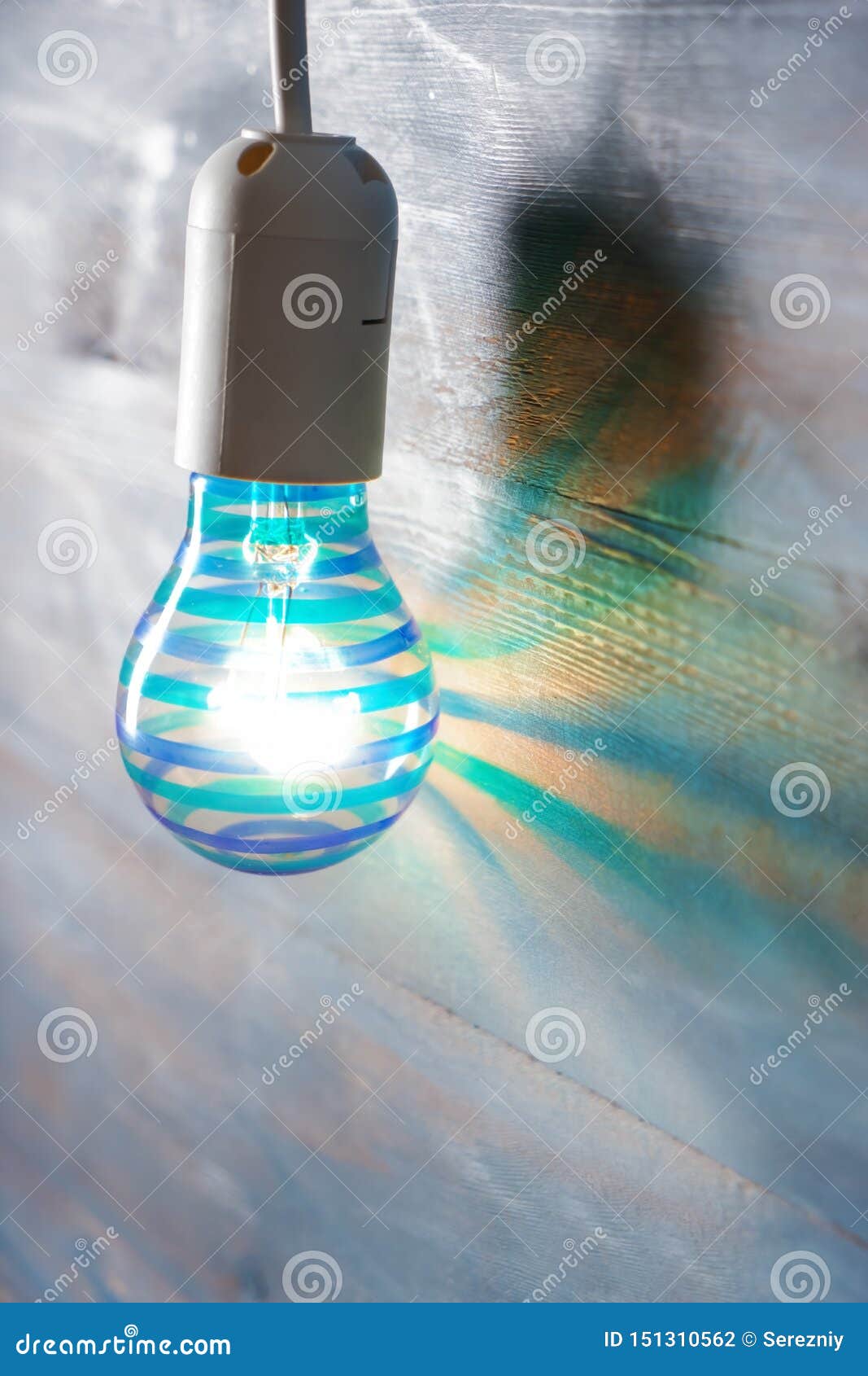Glowing Light Bulb Near Wooden Wall Stock Photo Image of decor, bulb