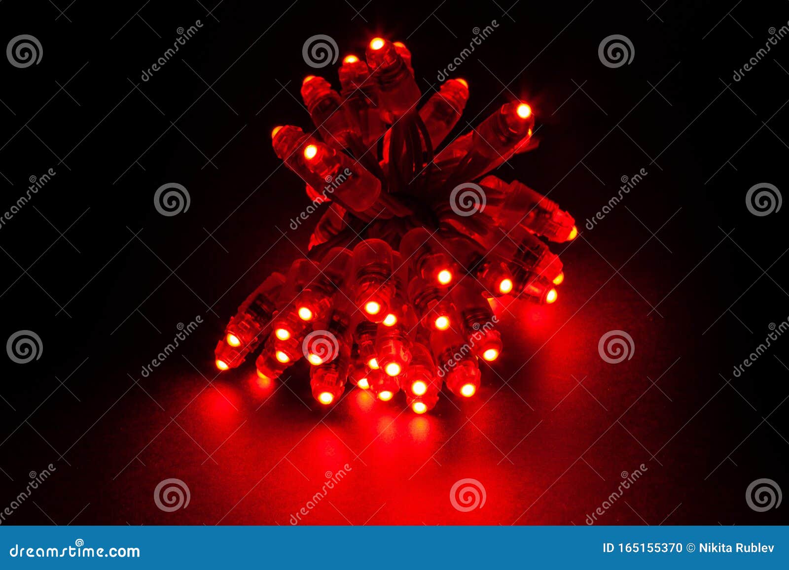 Glowing RED Led Pixels Christmas Holiday Lights on Black Background Pixels Christmas Lights