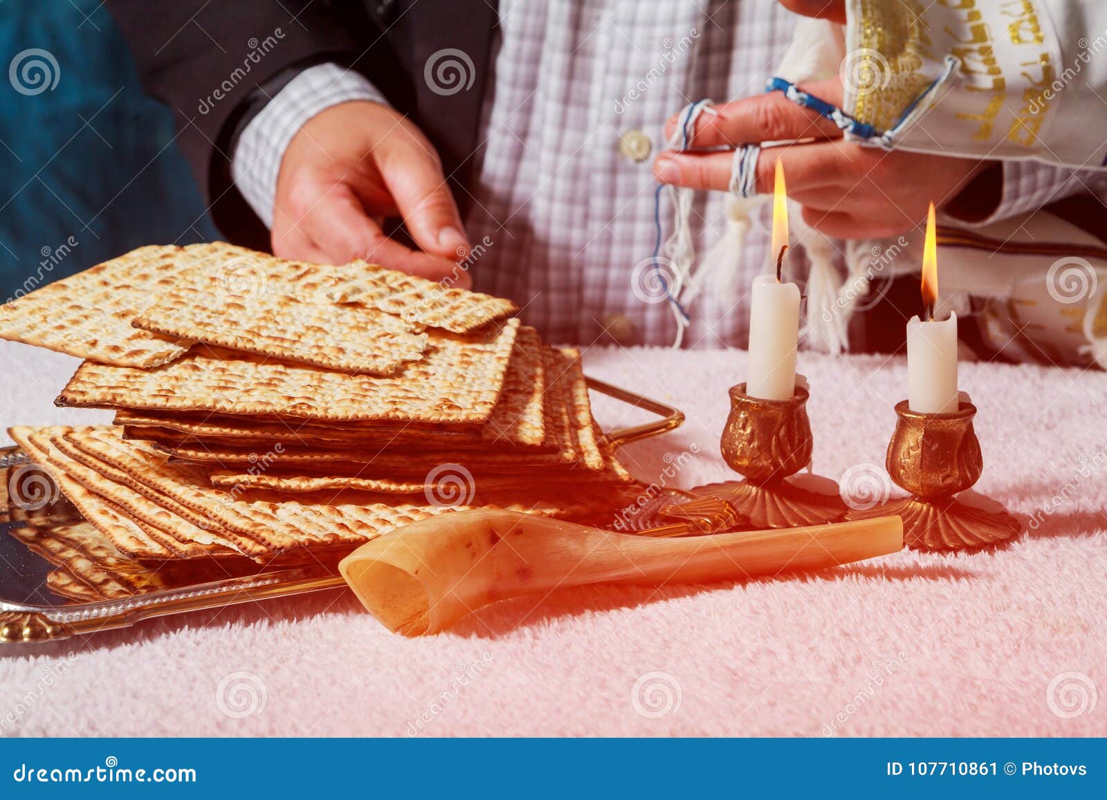 Glowing Sabbath Candles. Selective Focus Closeup on Two Wax Candles