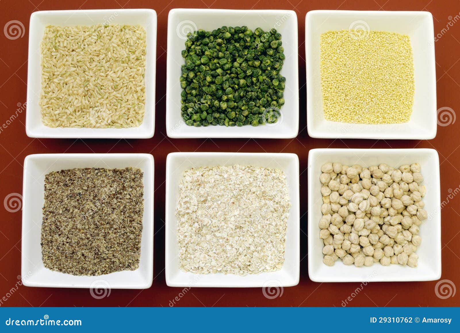 gluten free grains food - brown rice, millet, lsa, buckwheat flakes and chickpeas and green peas legumes - aerial close-up.