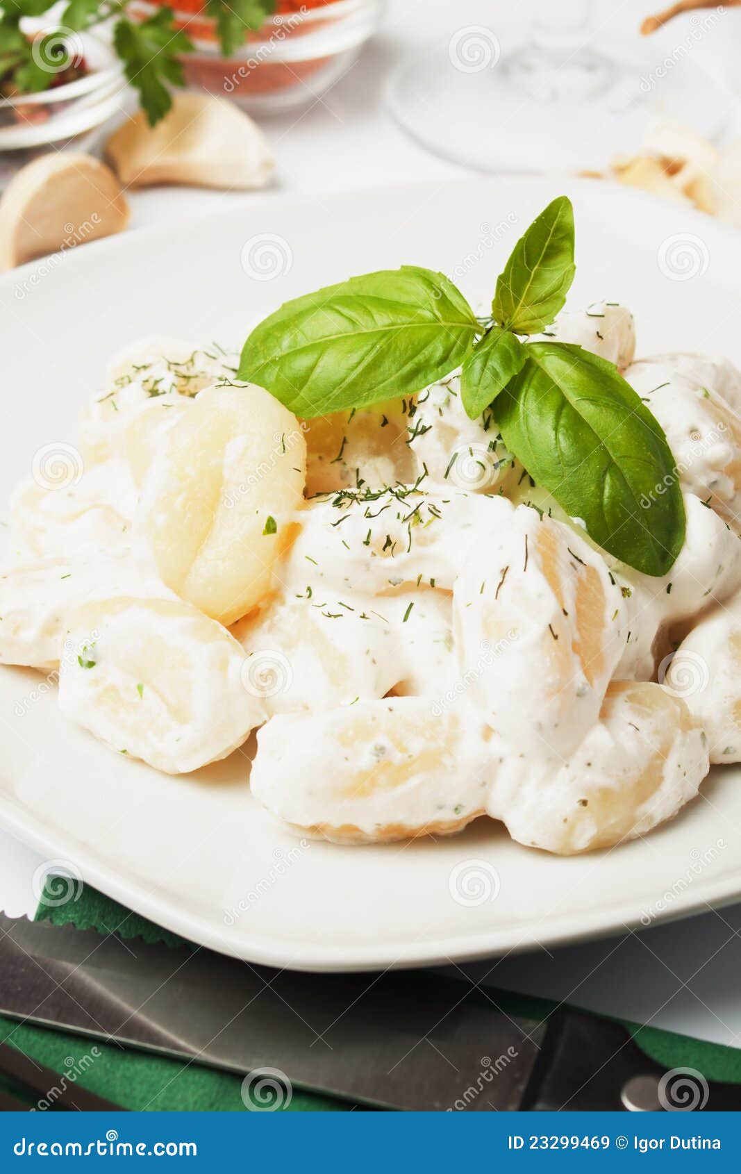 gnocchi di patata with basilico and cheese sauce