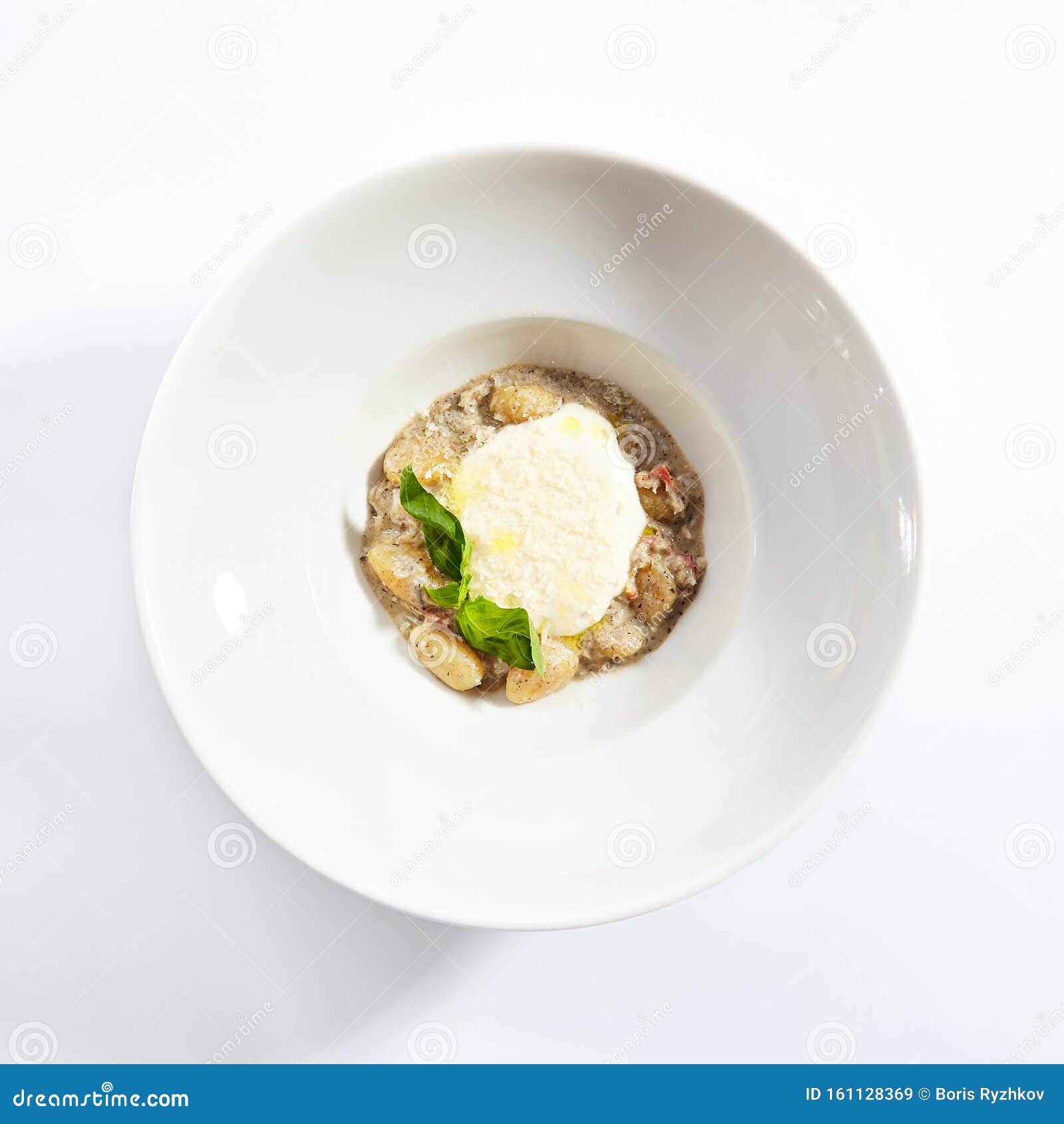 gnocchi in mushroom sauce with cheese espuma