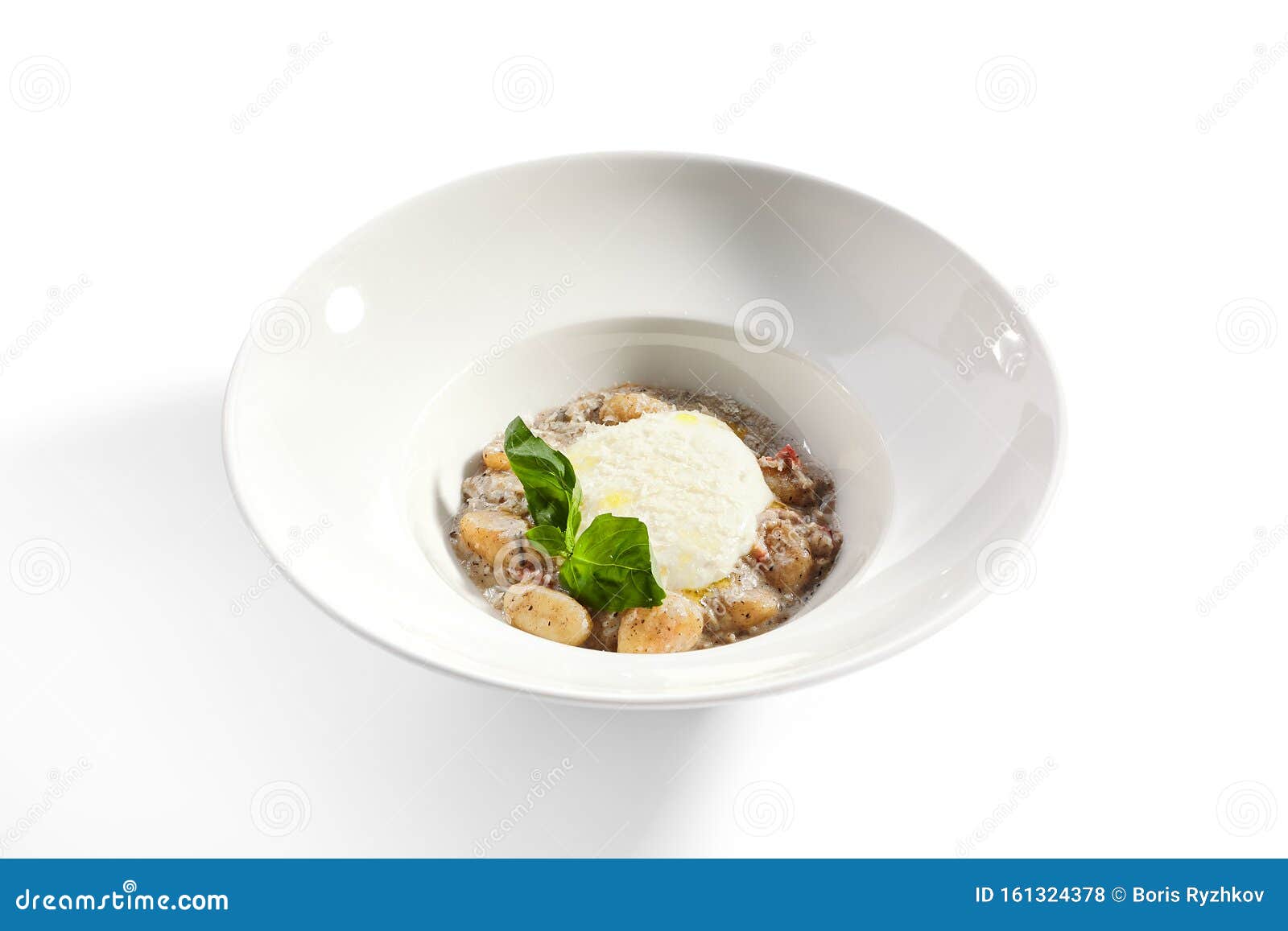 gnocchi in mushroom sauce with cheese espuma