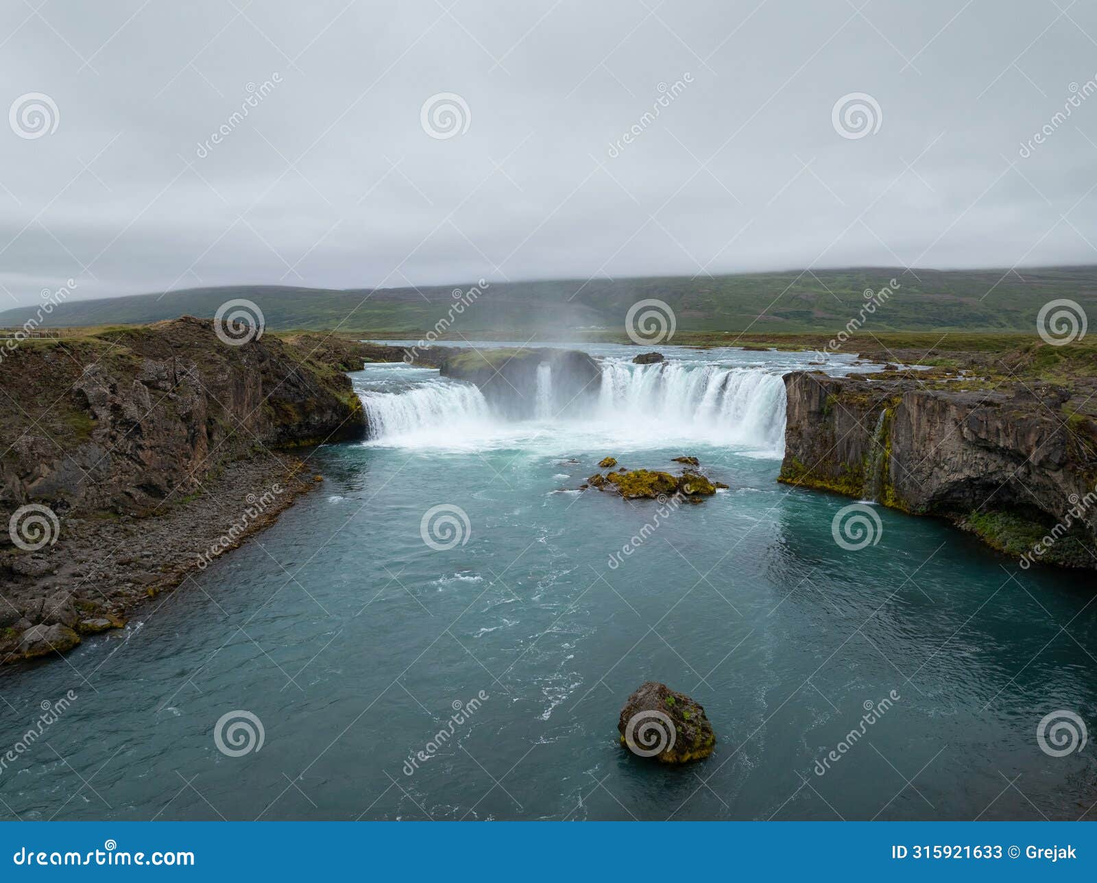 godafoss waterfall in iceland and its incredible surroundings, aerial view