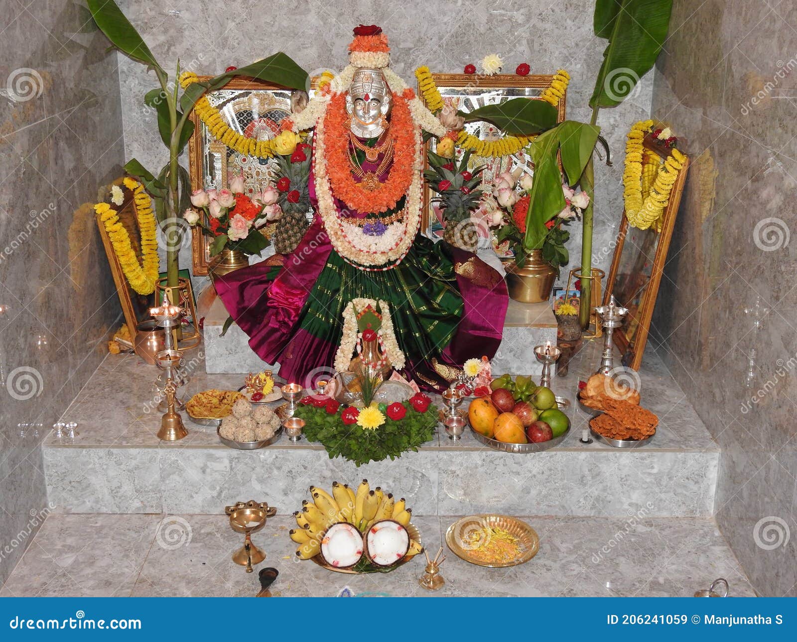 Goddess Lakshmi Statue Decoration Using Flower and Gold Jewellery during  Festival of Vara Mahalakshmi Festival. Varalakshmi Vratam Stock Image -  Image of karnataka, flower: 206241059