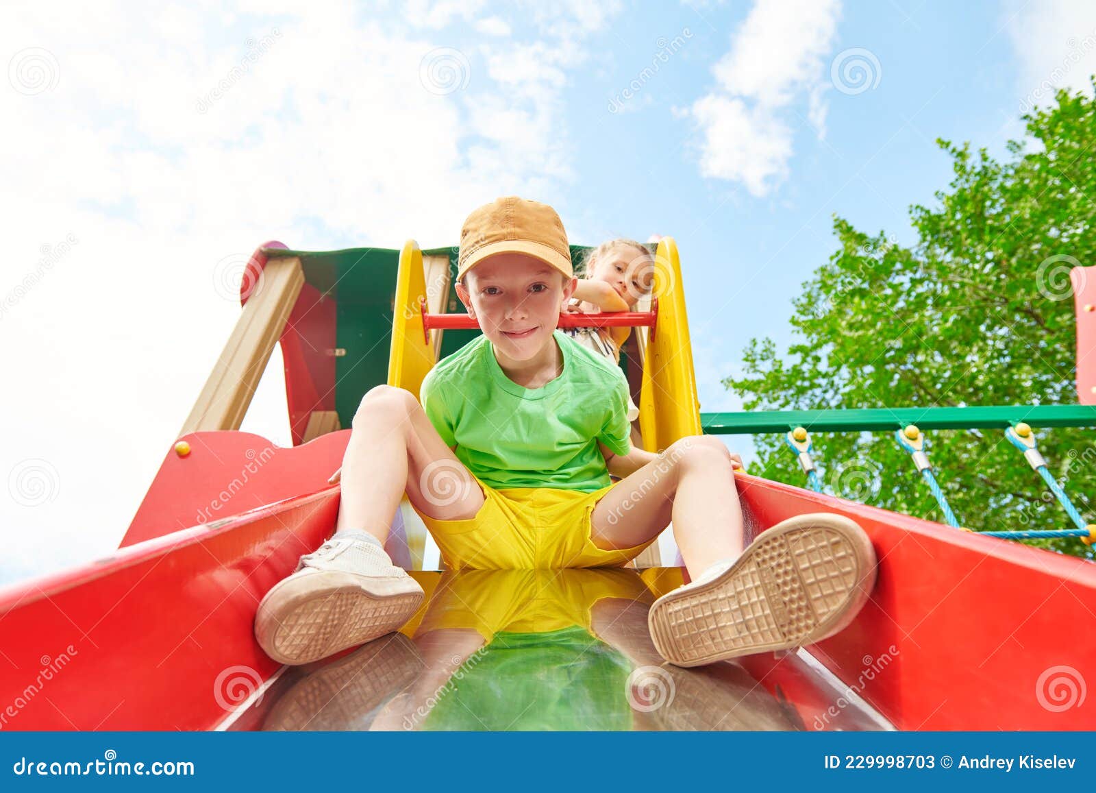Going down the slide stock image. Image of friends, childhood 229998703