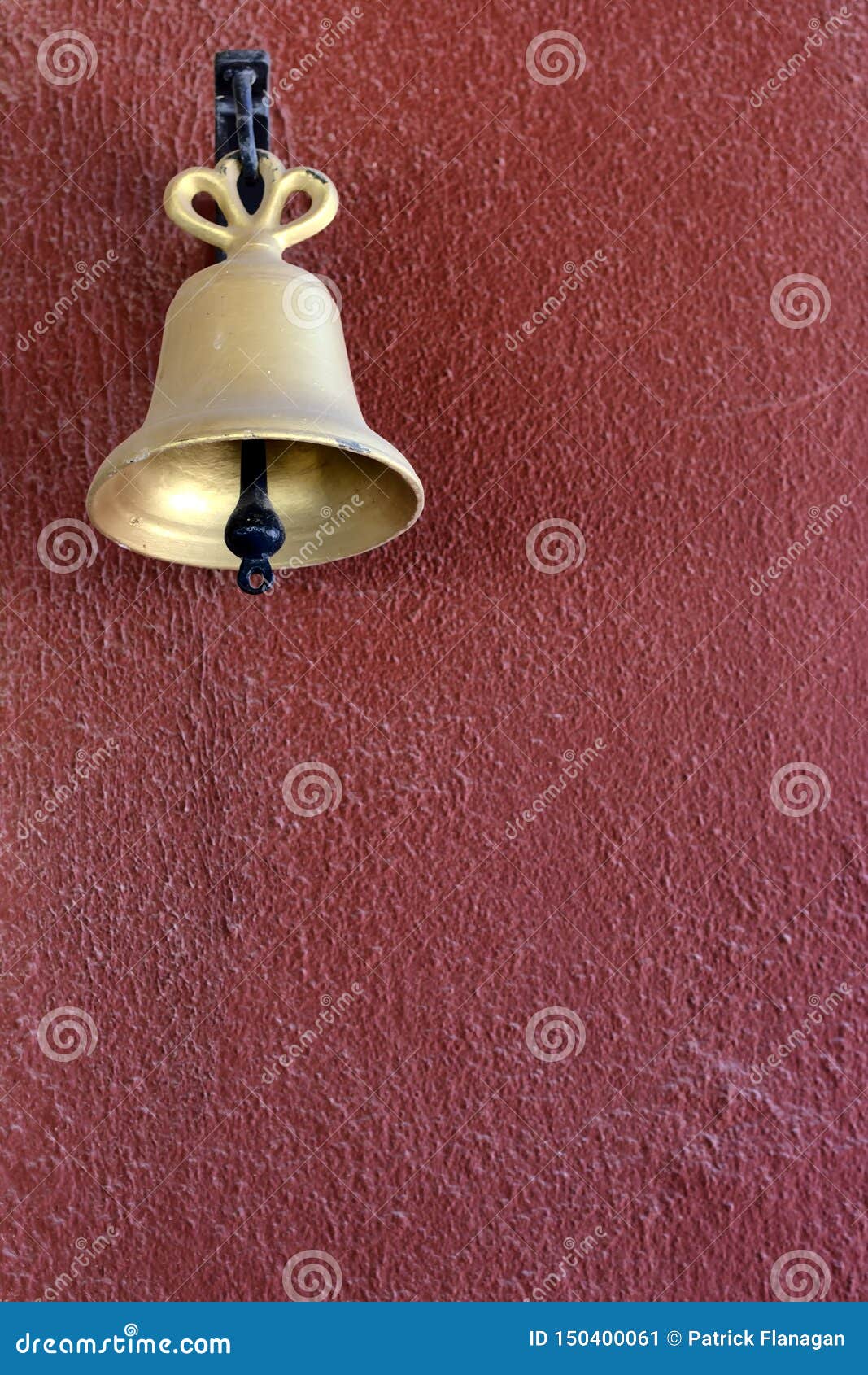 A Gold Bell on a Red Painted Wall Stock Image Image of glass, brown