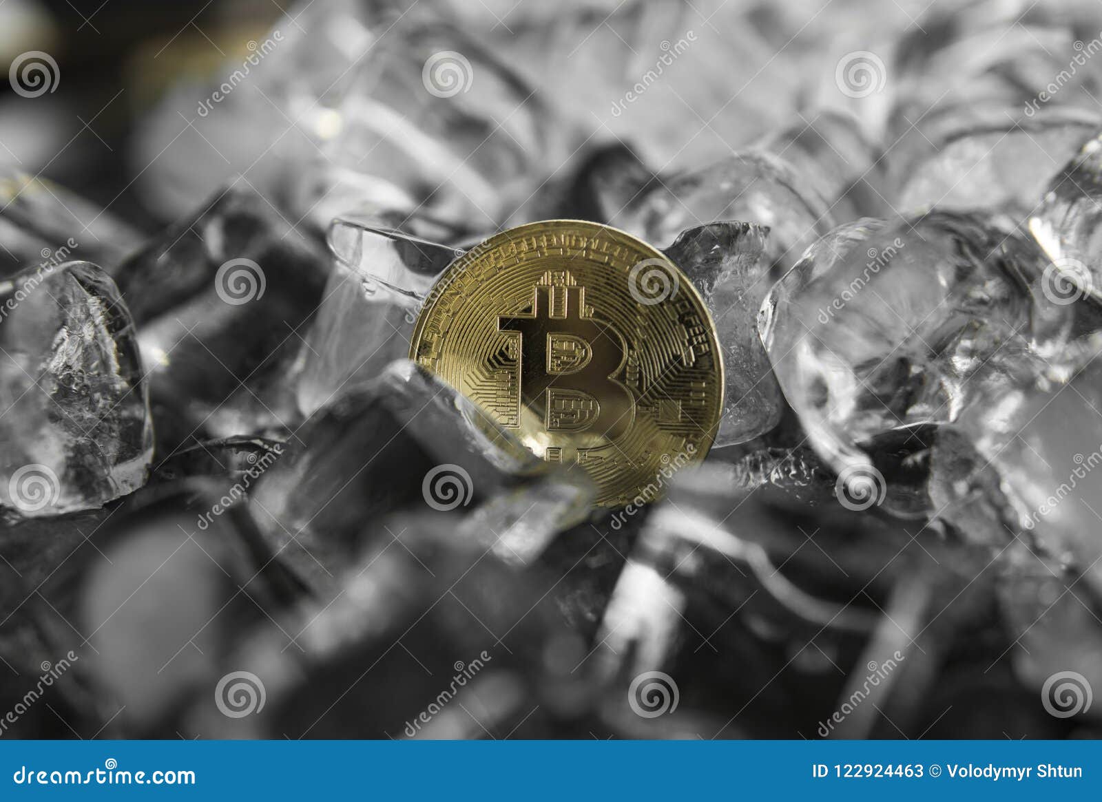 Gold Bitcoin On Ice Background. The Concept Of The ...