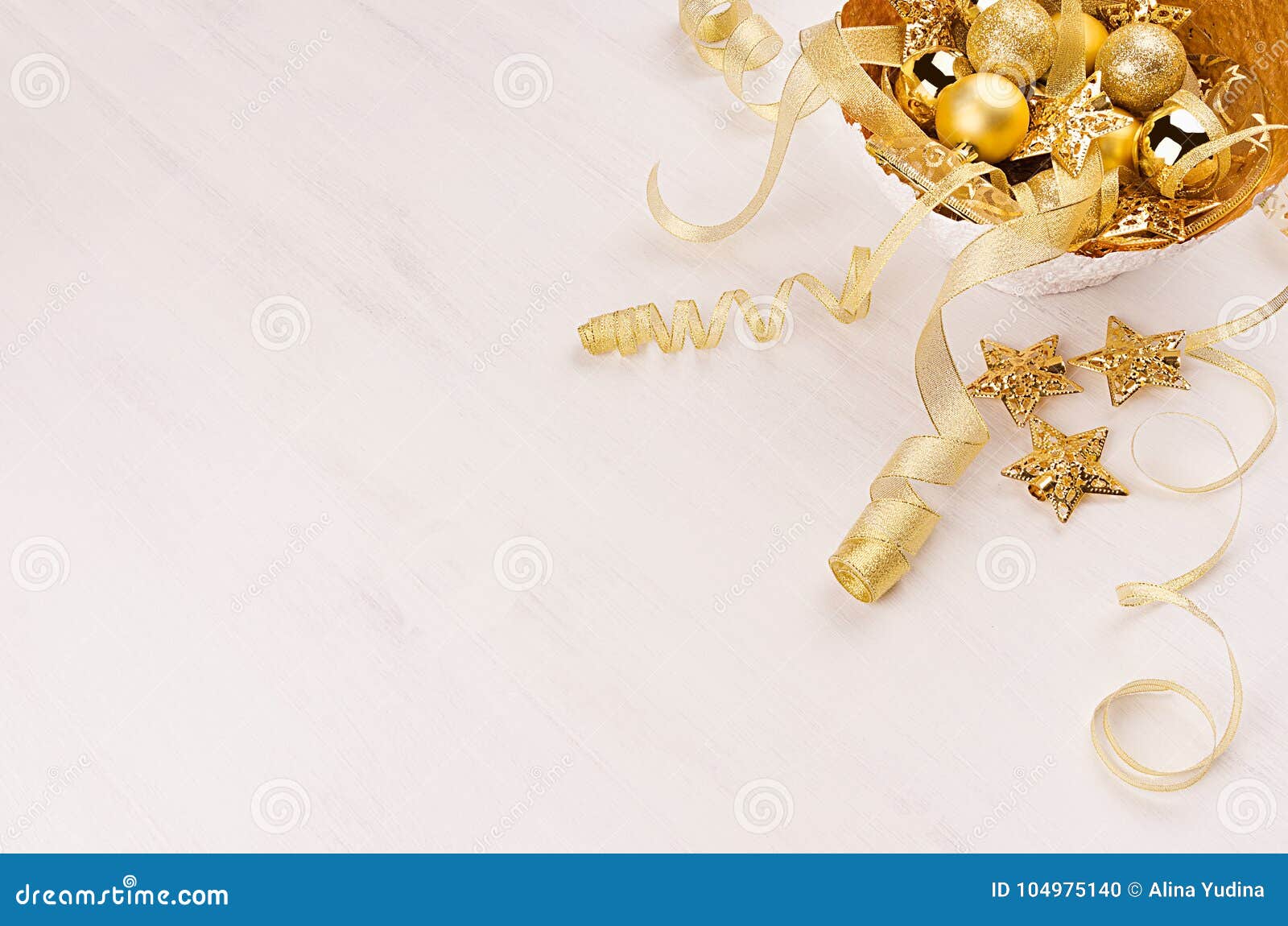 Gold Bowl with Christmas Stars, Balls, Ribbons on White Wood Board ...