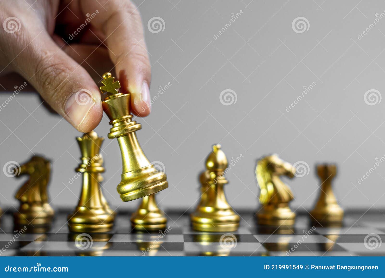 Free Photo  Gold and silver chess on chess board game for business  metaphor leadership concept