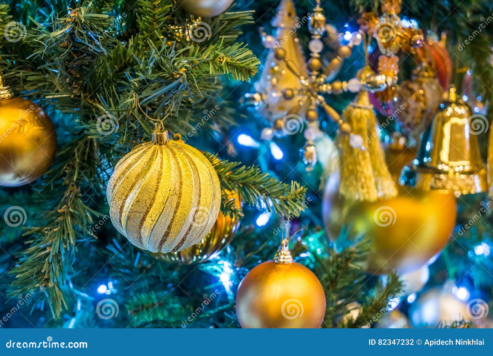 Gold Christmas Baubles on Branch Stock Photo - Image of green ...
