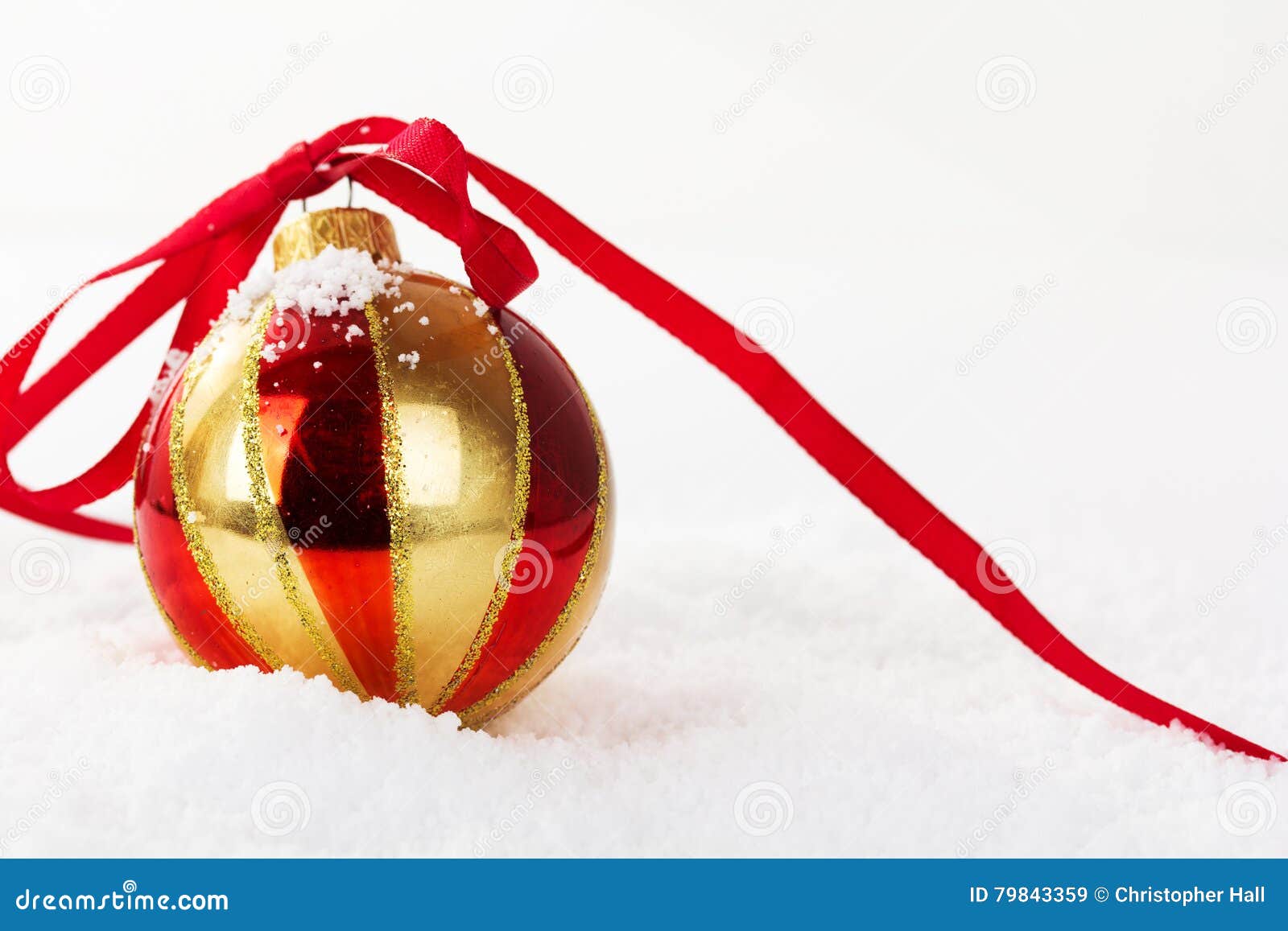 Gold Christmas Decorations in White Snow for Background Stock Image ...