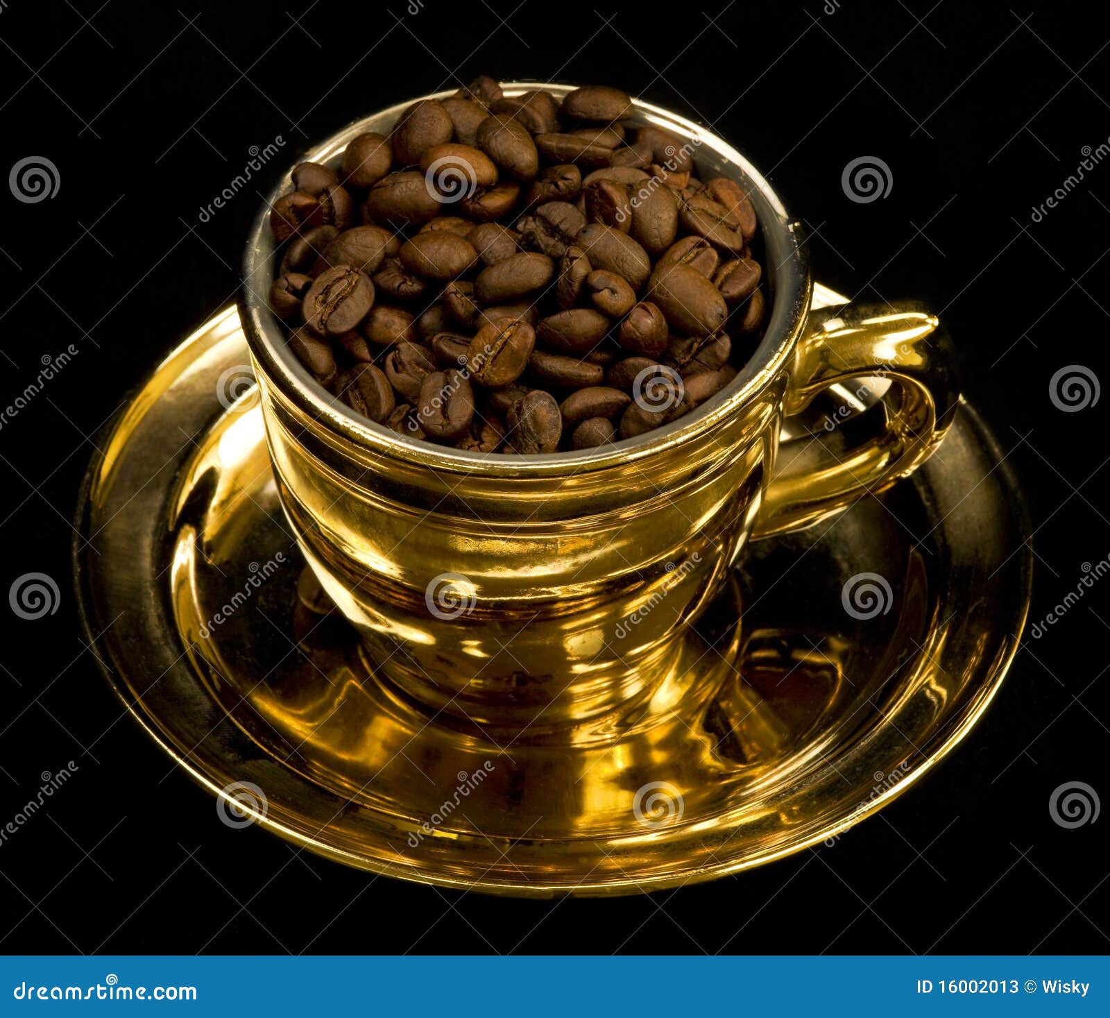 Gold cup with coffee beans stock image. Image of beverage 16002013