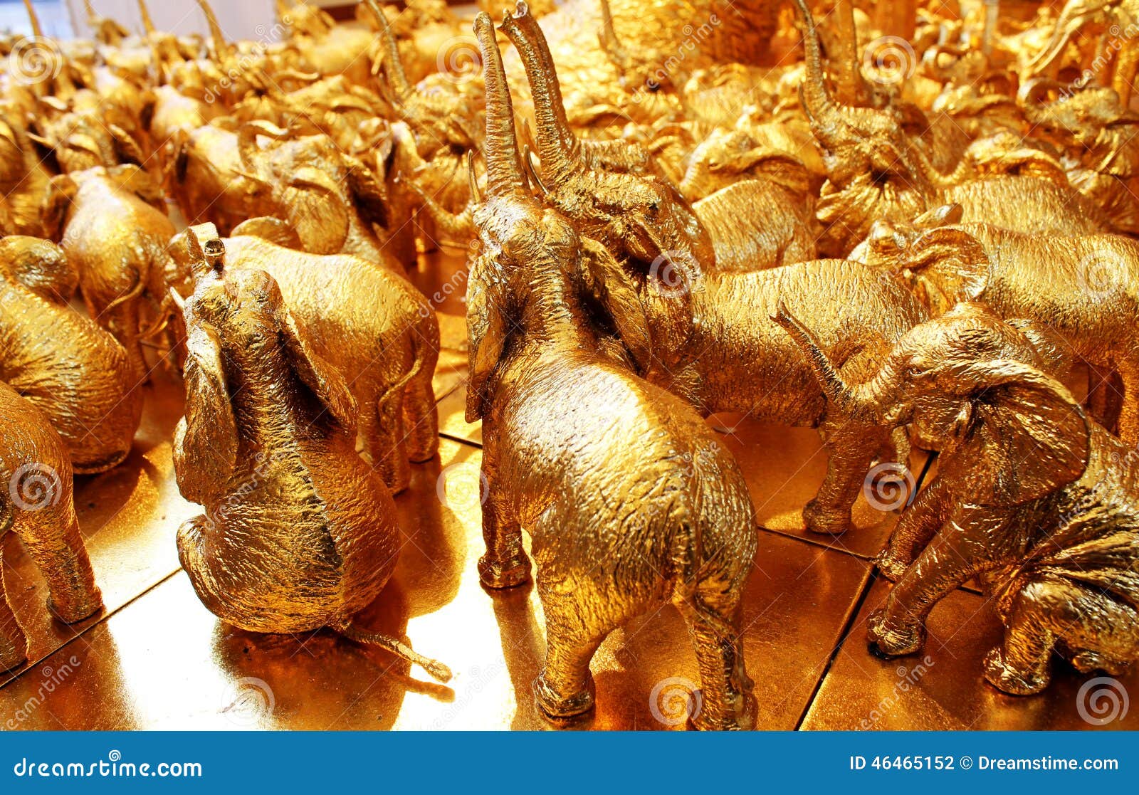 Gold Elephants stock photo. Image of tusks, trunksupraised 46465152