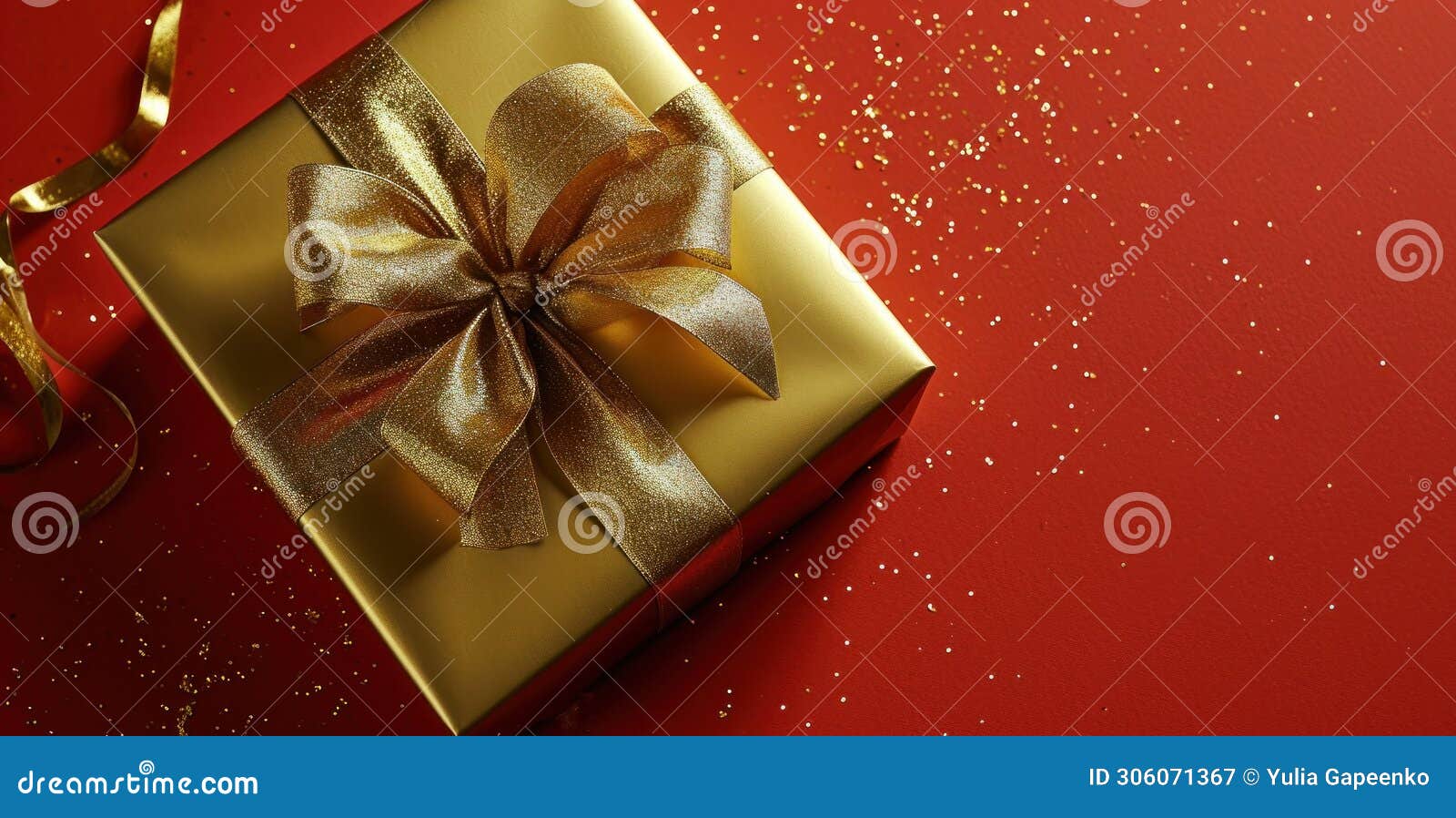 gold gift box, ribbon on rudo red background