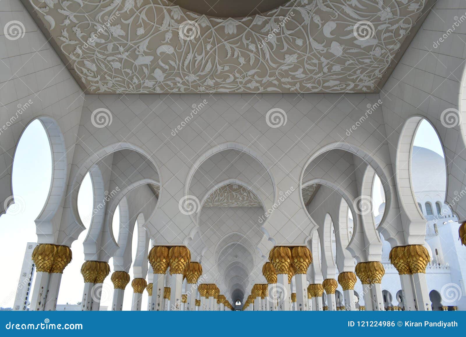 gold gilted columns sheikh zayed grand mosque