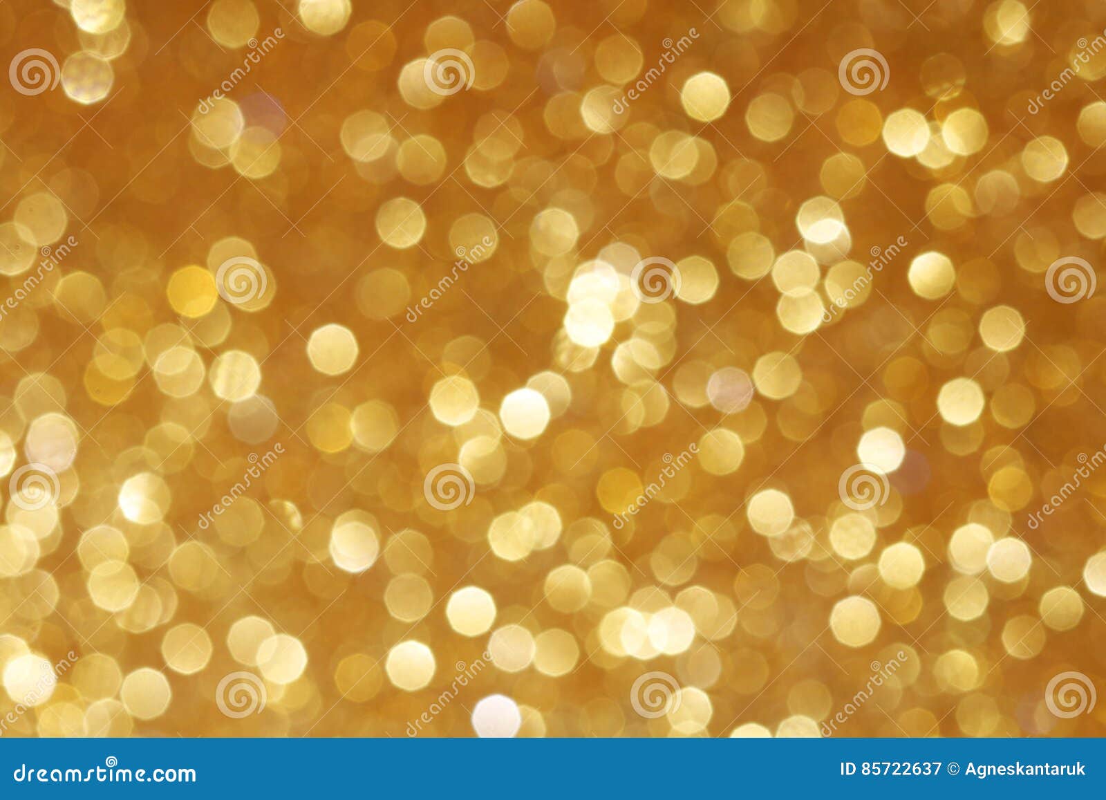 Gold Glittering Christmas Lights. Blurred Abstract Background Stock