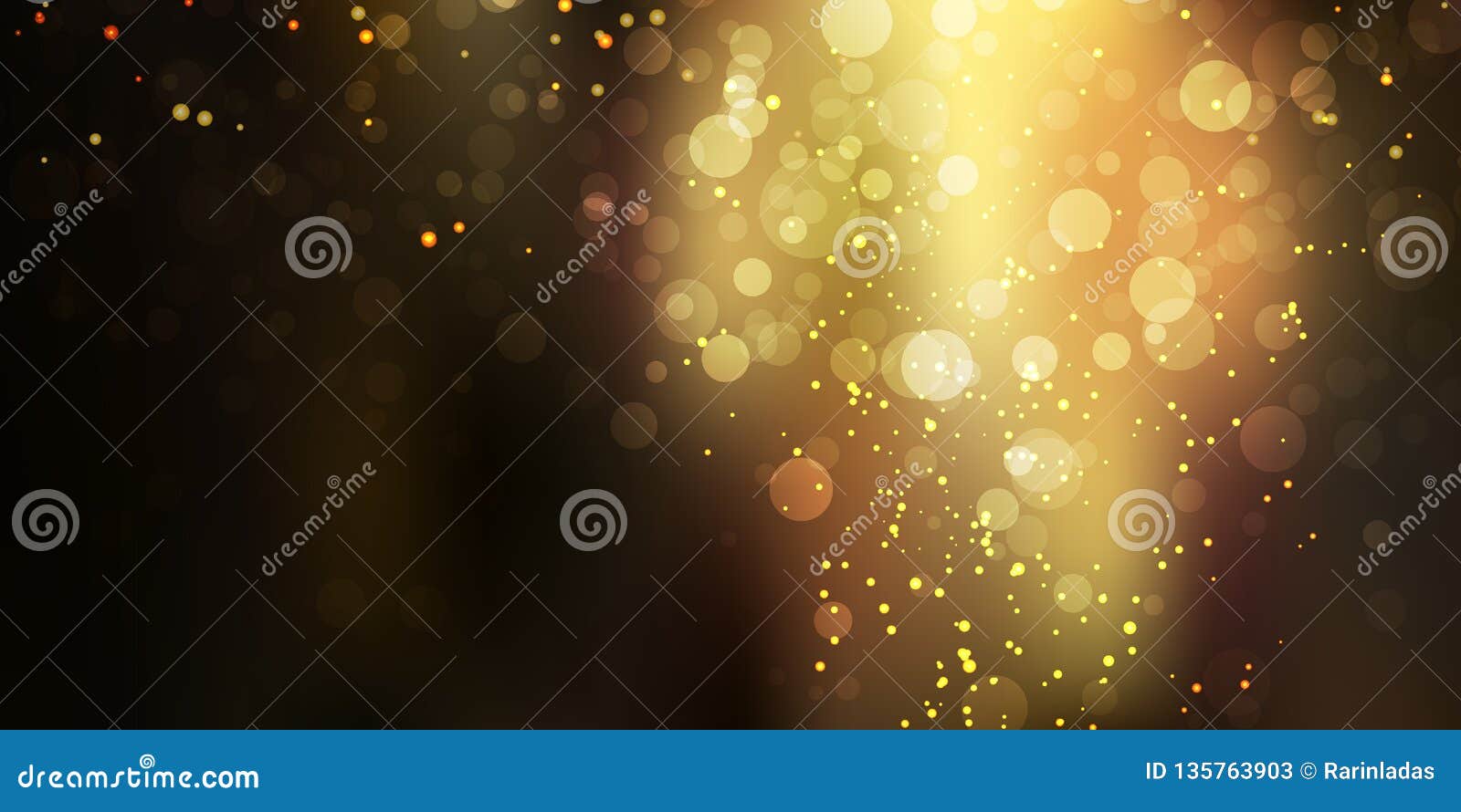 gold glittering sparkle stardust on black background with bokeh lights