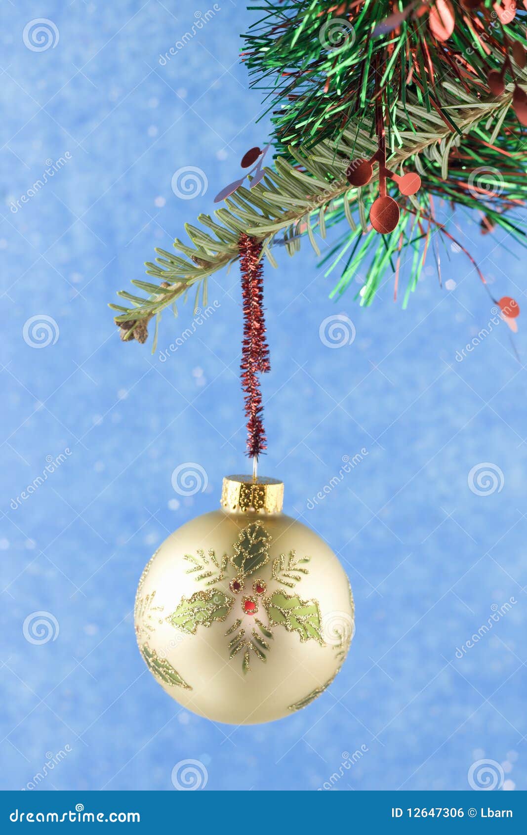 Gold Holly Bauble on Blue Background Stock Photo - Image of xmas, shiny ...