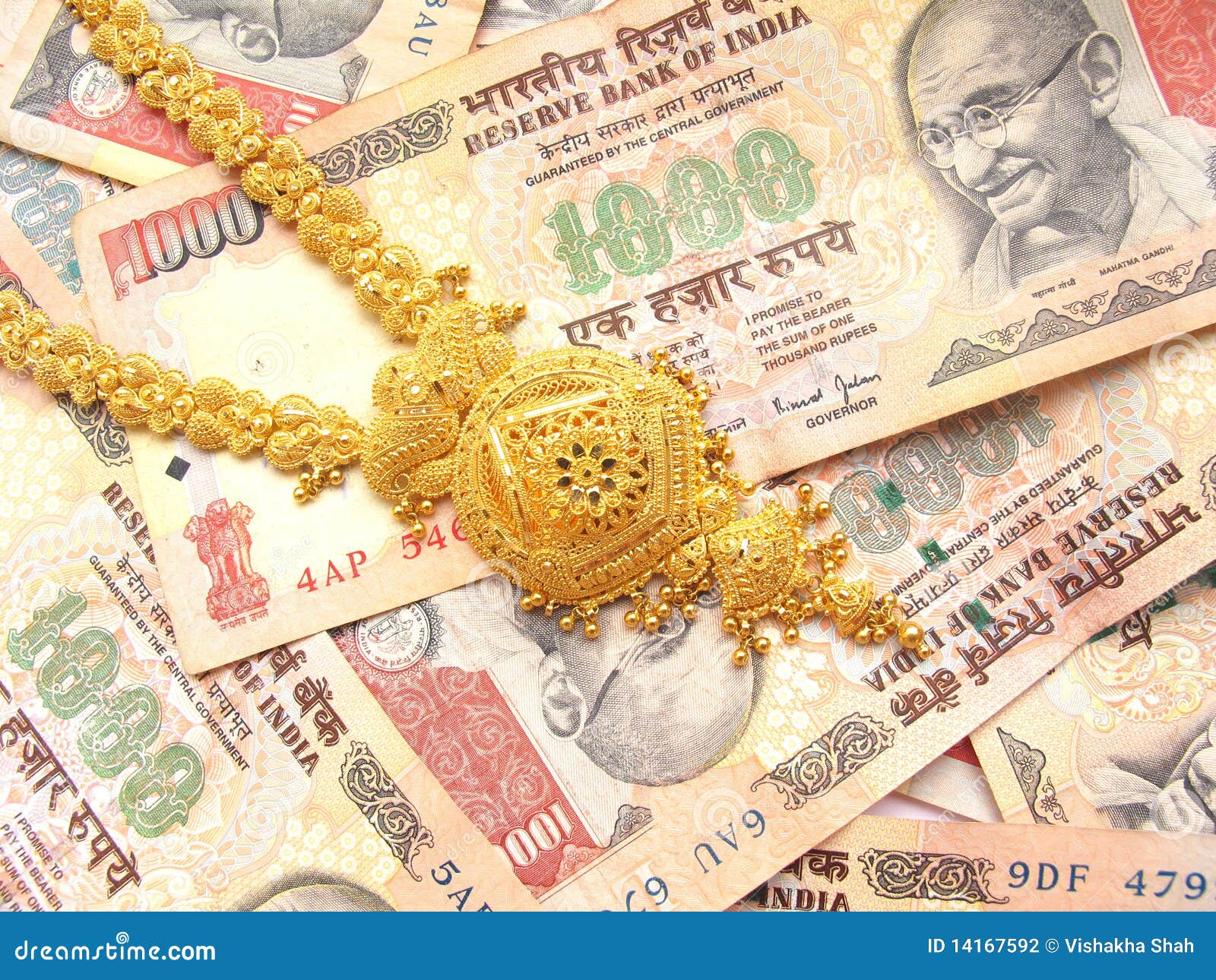 Gold and Indian Currency stock photo. Image of credit 14167592