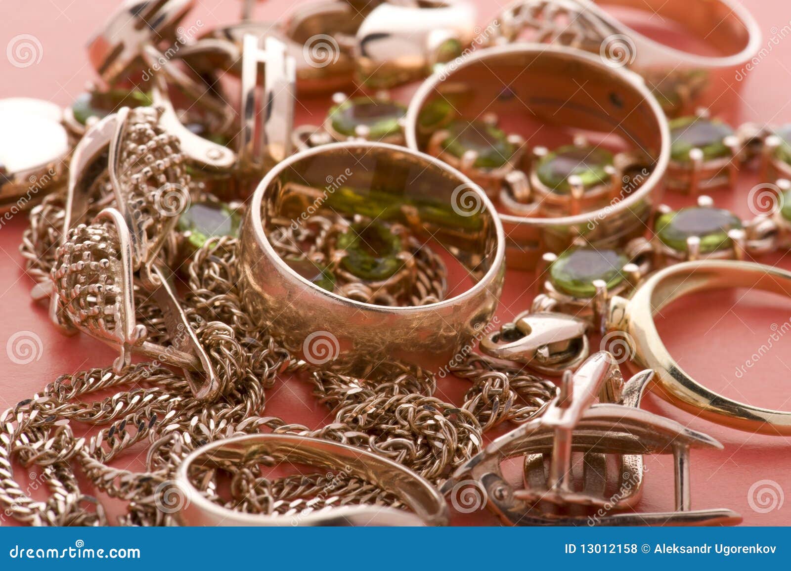 Gold jewel on red close up stock photo. Image of jewel 13012158