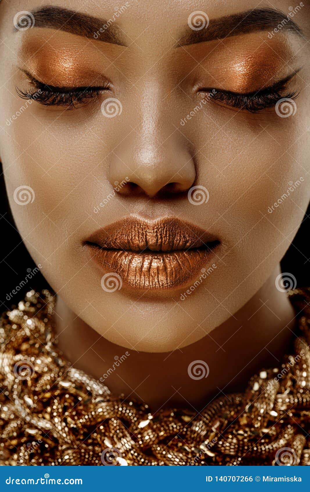 gold luxury black skin woman african ethnic female face. young african american model with jewelry