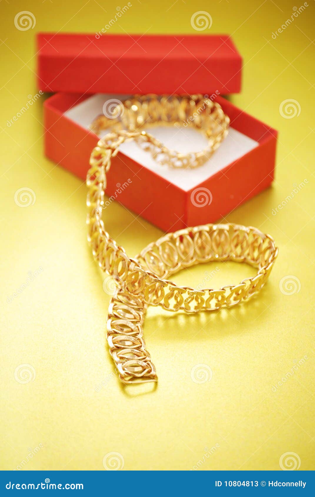 Gold necklace and gift box stock image. Image of decorative 10804813