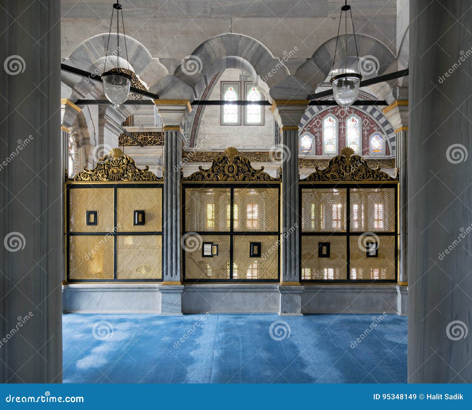gold painted decorated interleaved wooden windows mashrabiya inside three marble arches, nuruosmaniye mosque, istanbul, turkey