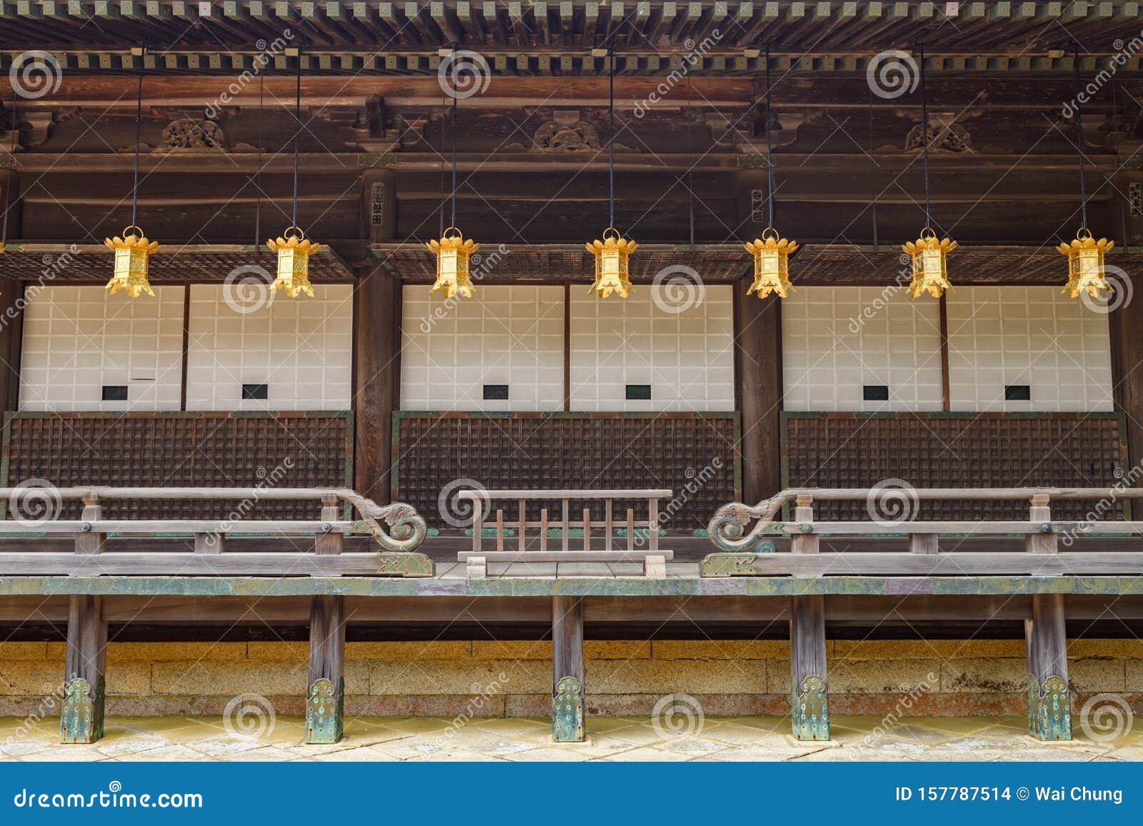 gold lanterns hanging from temple building