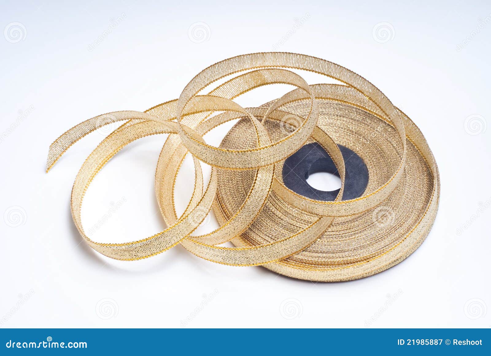 Gold ribbon roll stock image. Image of shiny, material 21985887