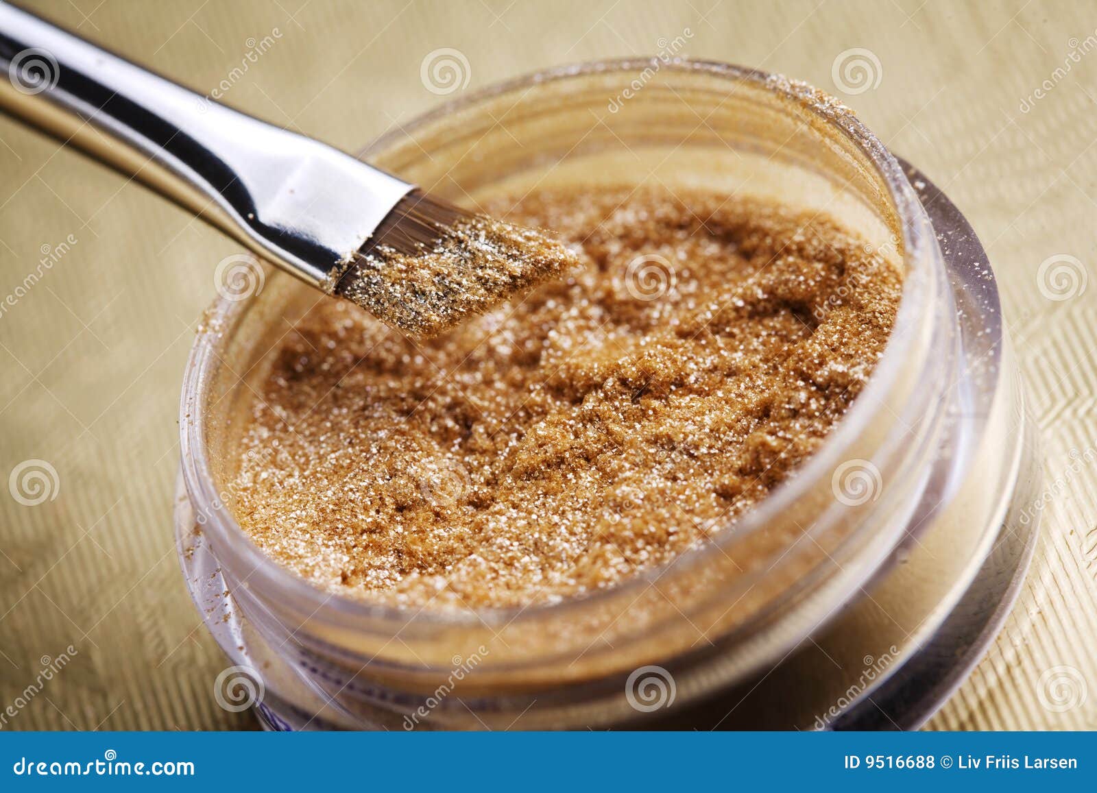 Gold shimmer makeup stock photo. Image of horizontal, brush 9516688