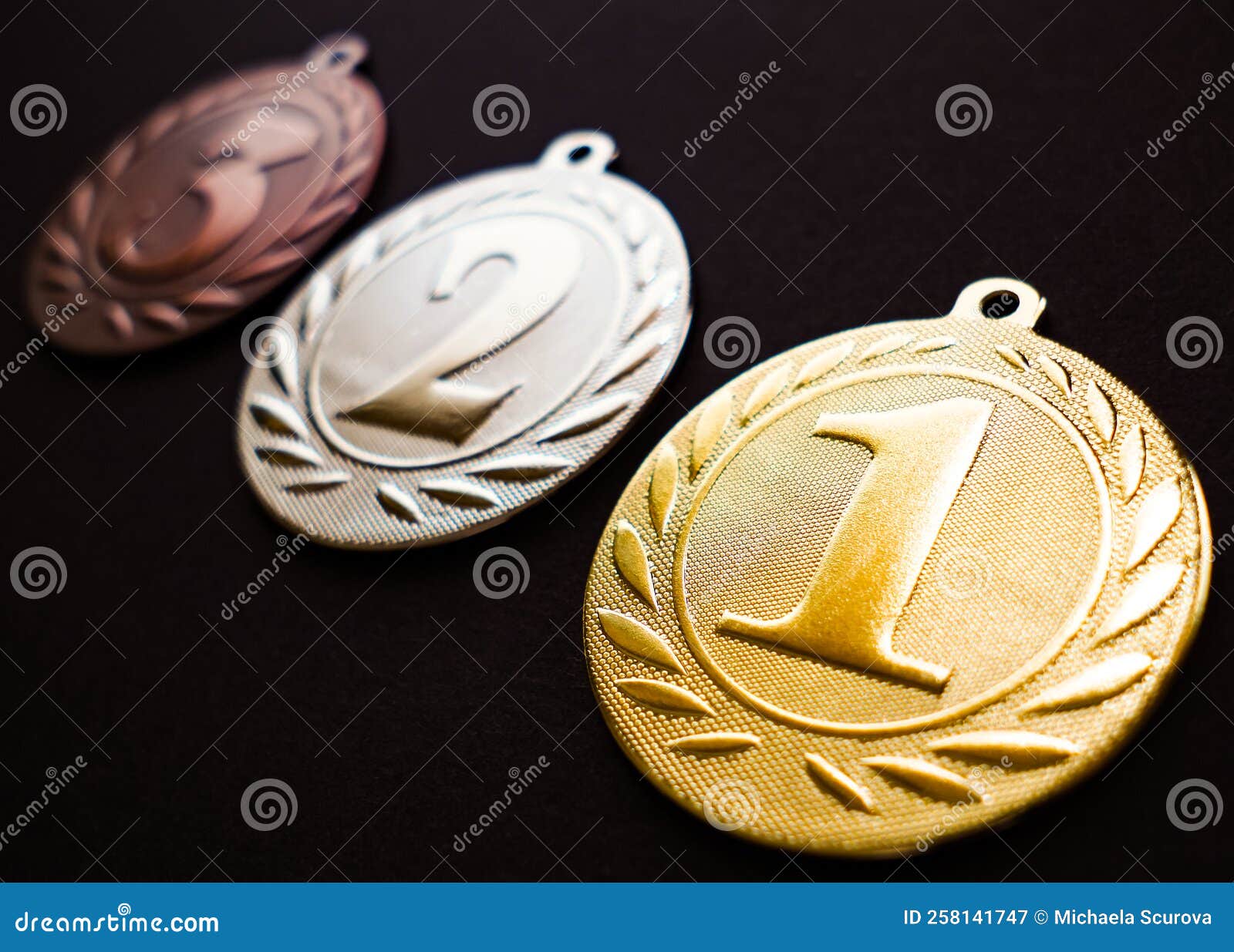 gold silver and bronze medal, medal set, black background, dark edit space