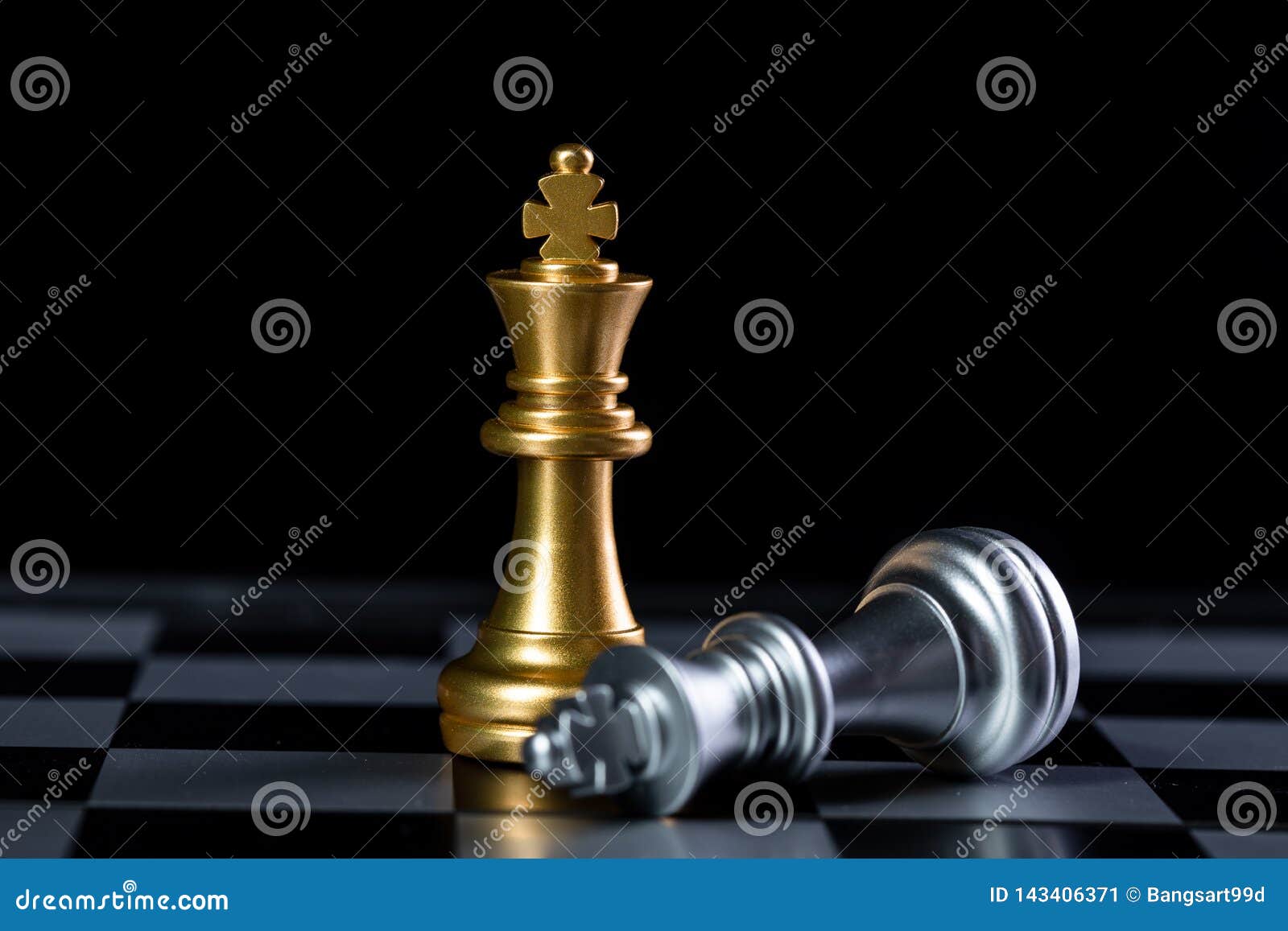 Silver Chess Pieces King And Queen Isolated On Black Background Royalty