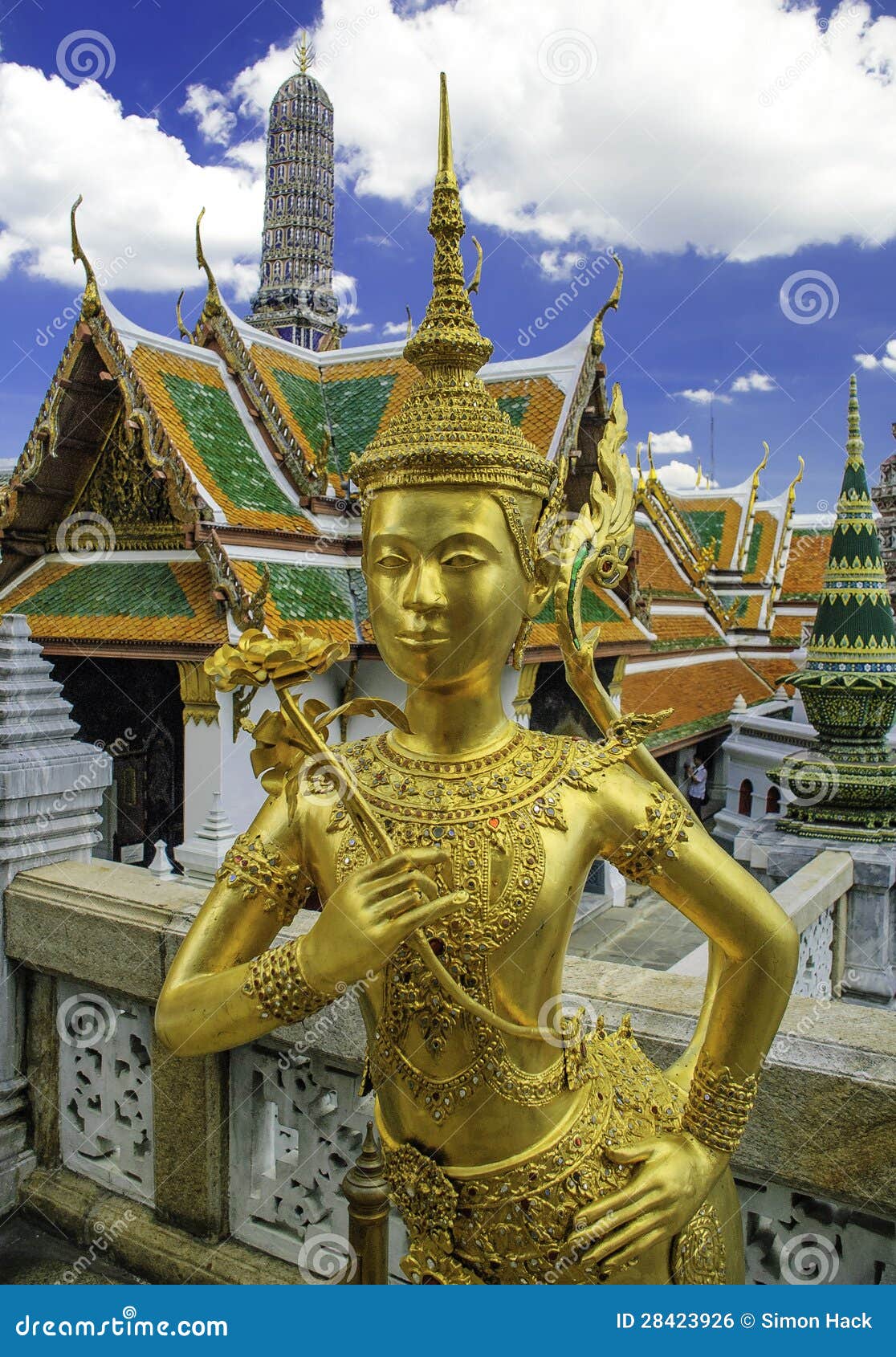 gold statue at the royal palace in bangkok,thailand