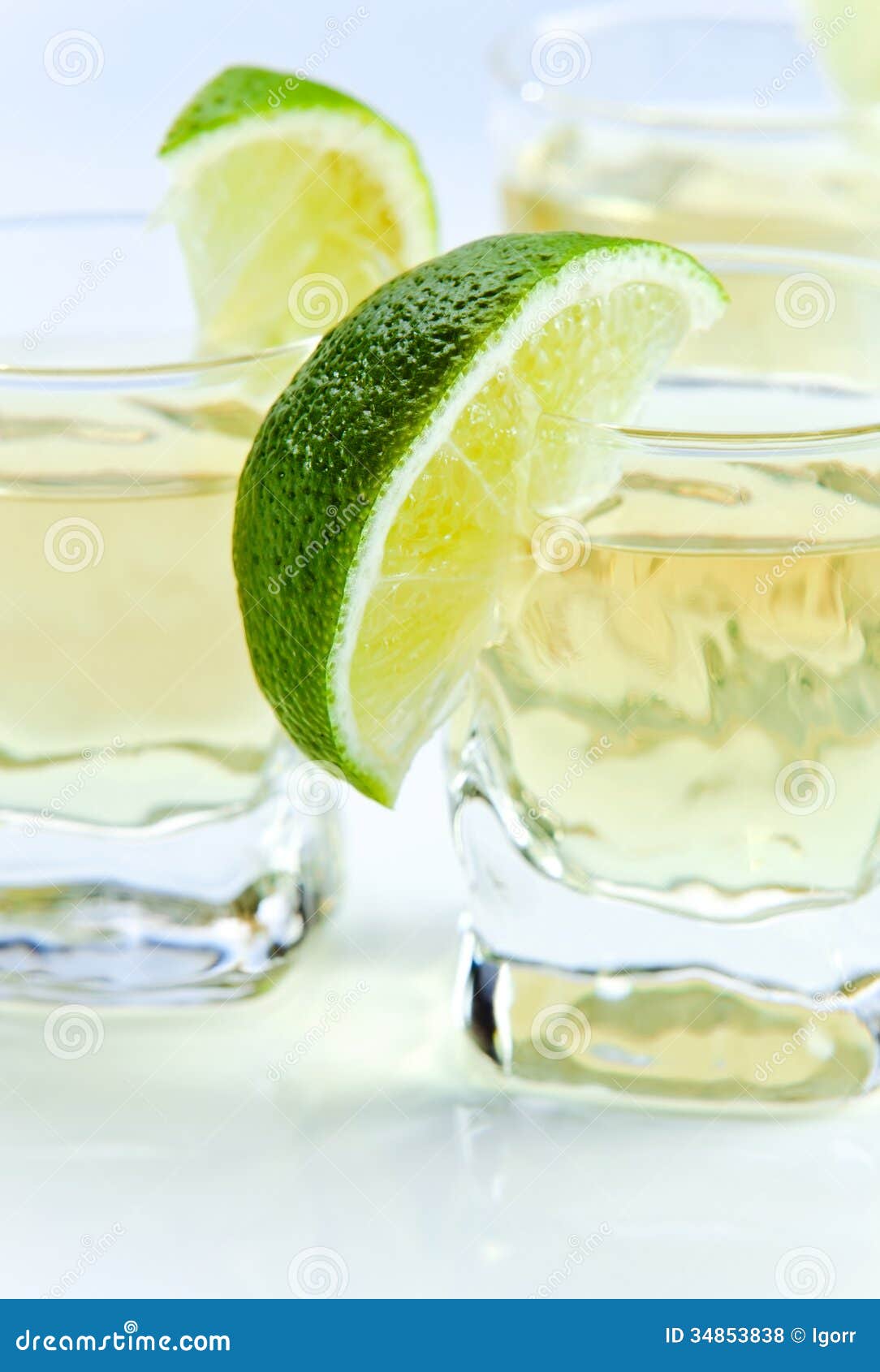 Gold tequila with lime stock photo. Image of liquid, food 34853838