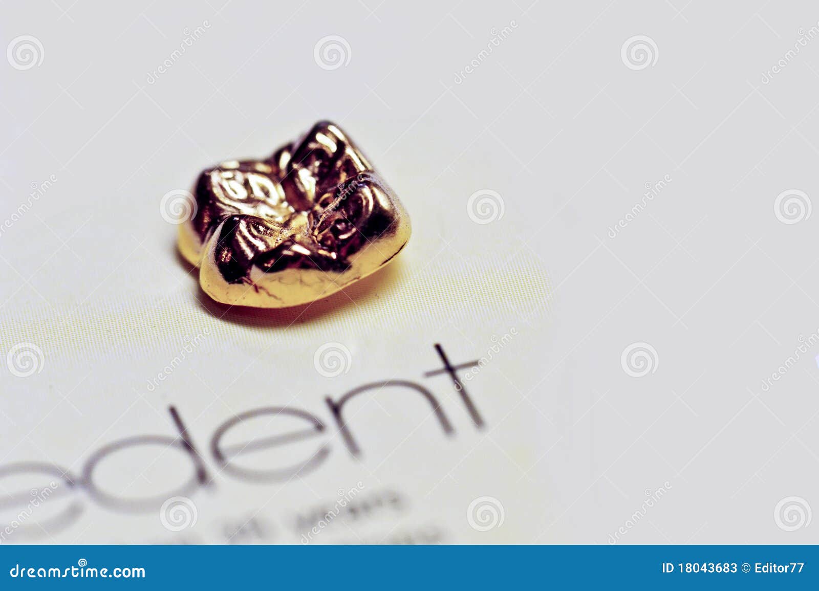 Dental crown made by gold stock image. Image of single 18043683