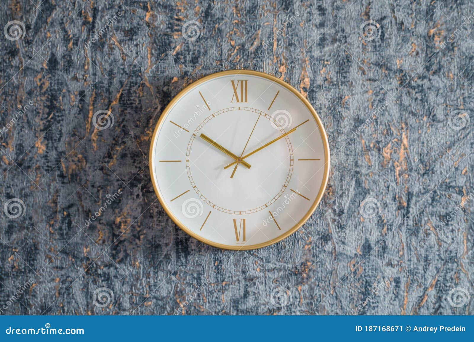 Gold watch on the wall stock image. Image of deadline 187168671