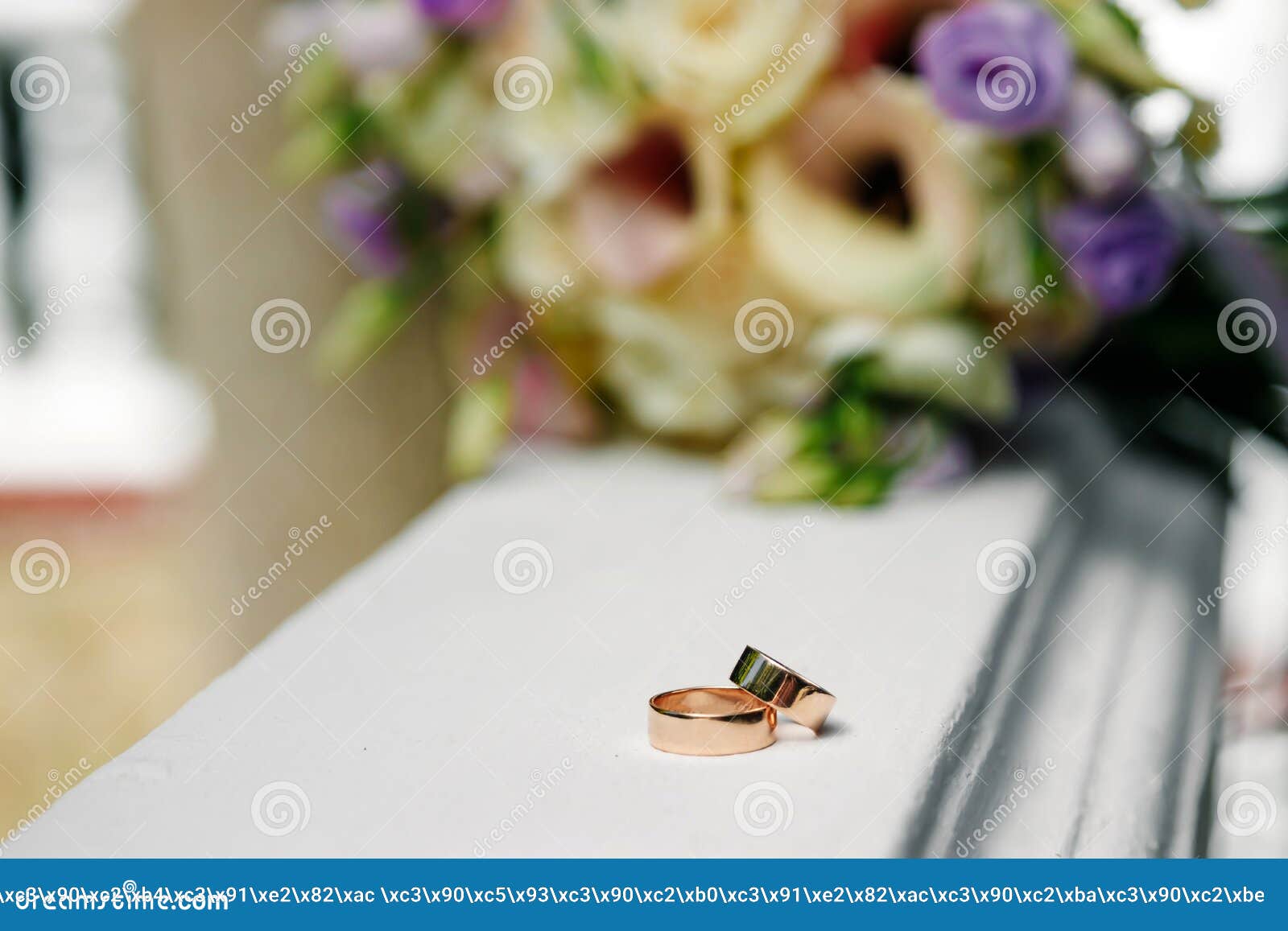 Gold Wedding Rings on Purple Beautiful Flowers Stock Image - Image of ...