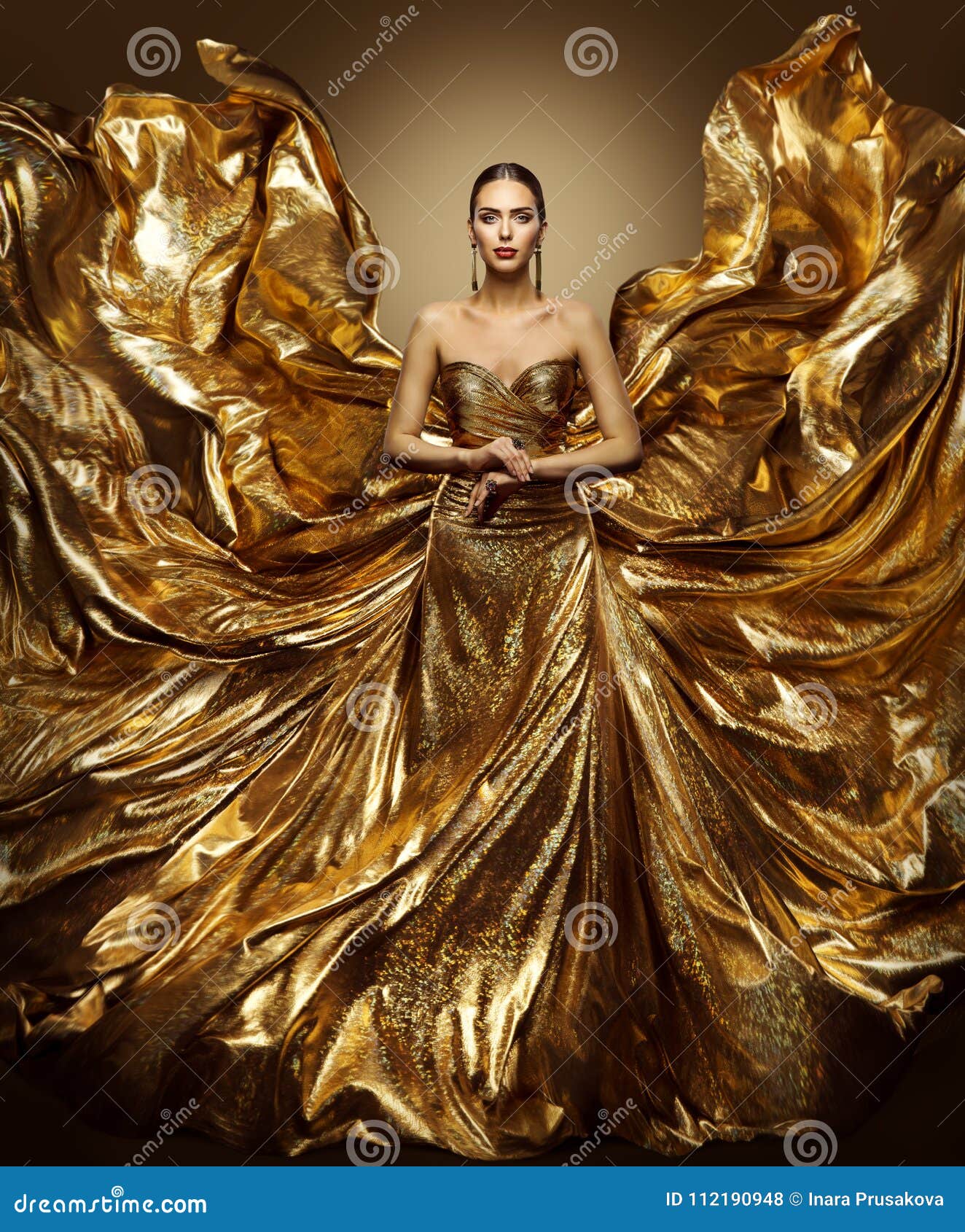 udobnost, izazov - Page 16 Gold-woman-flying-dress-fashion-model-waving-golden-gown-fluttering-fabric-fly-like-wings-art-beauty-portrait-112190948