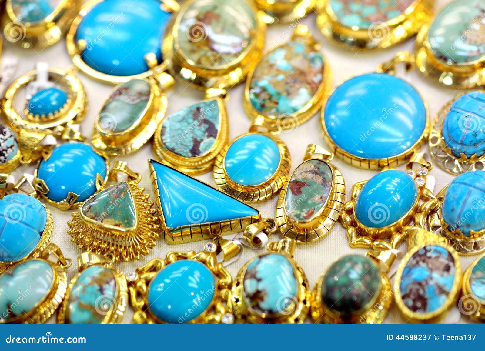 Golded Jewel with Turquoise Stock Image - Image of jewelry, brown: 44588237